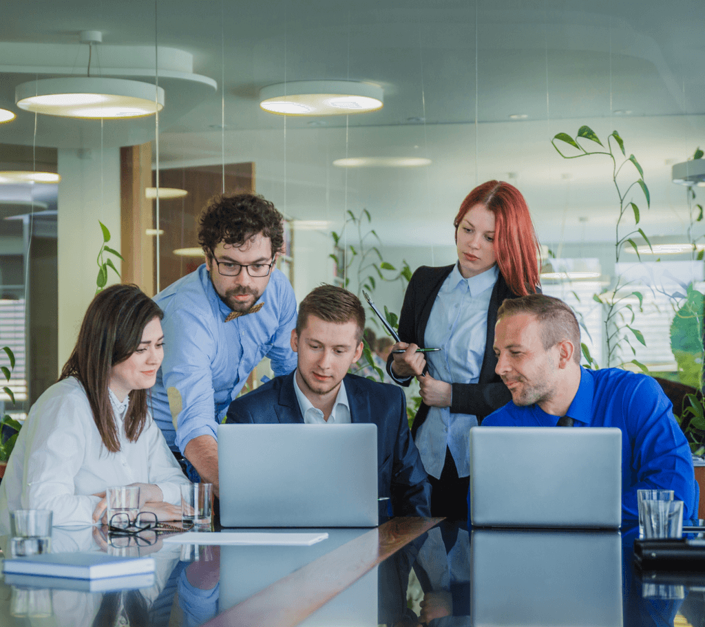 Office environment with team working collaboratively