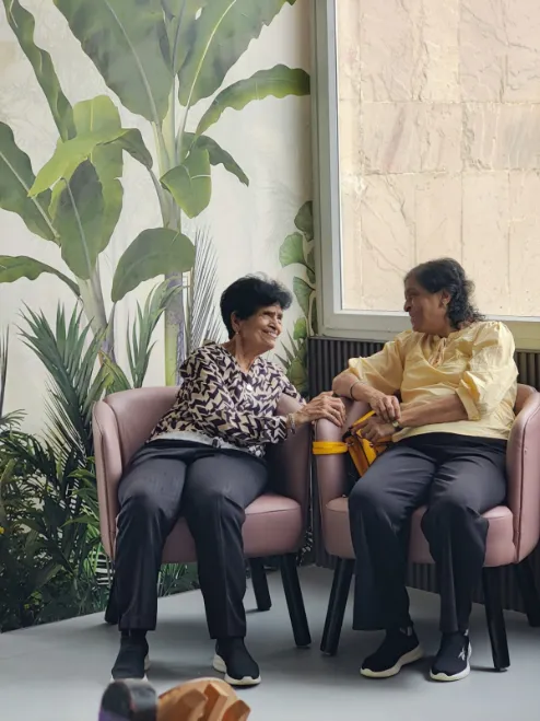 Members chatting at Aamra Seniors Club