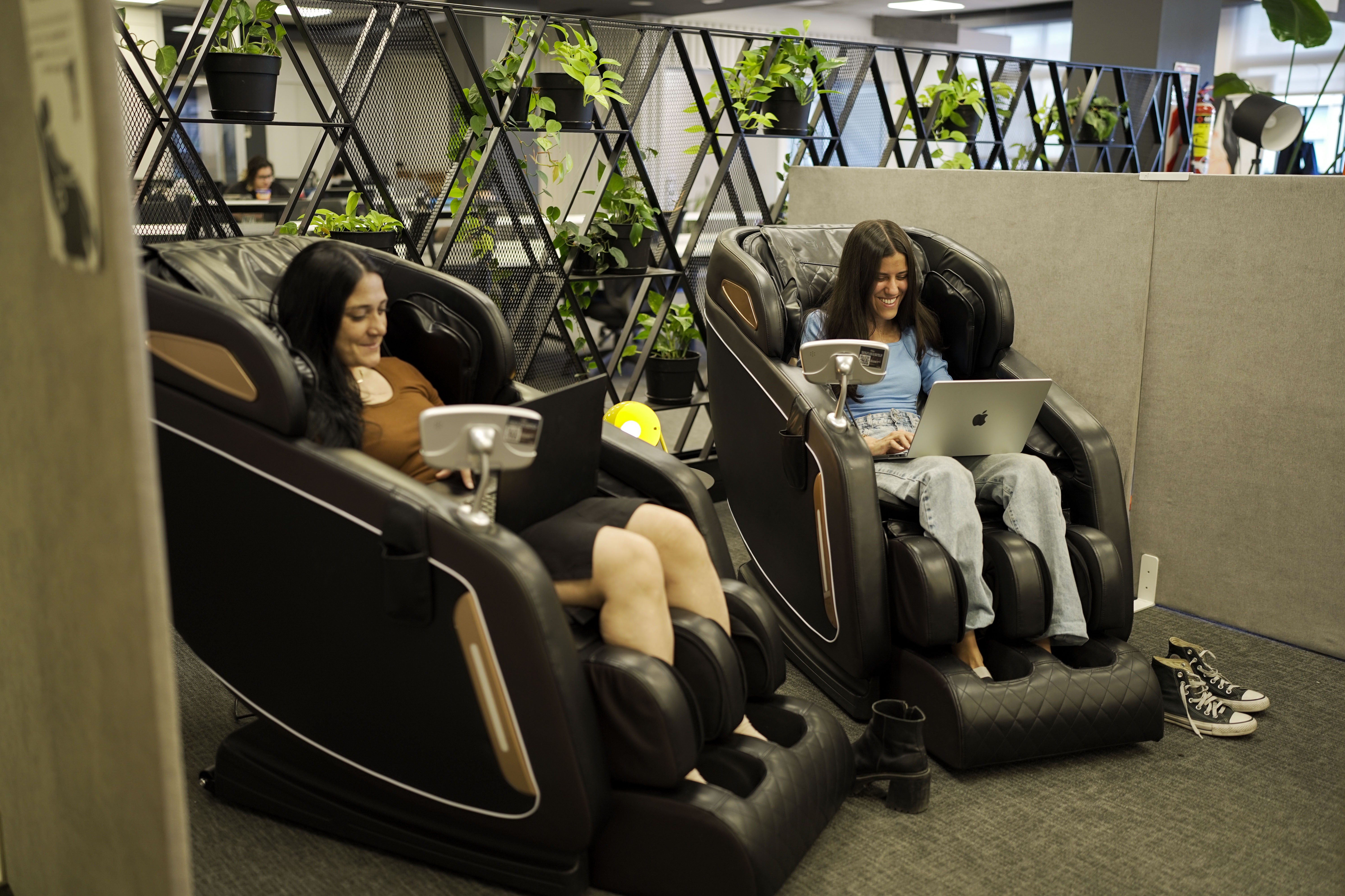 people sitting on chair near glass window during daytime