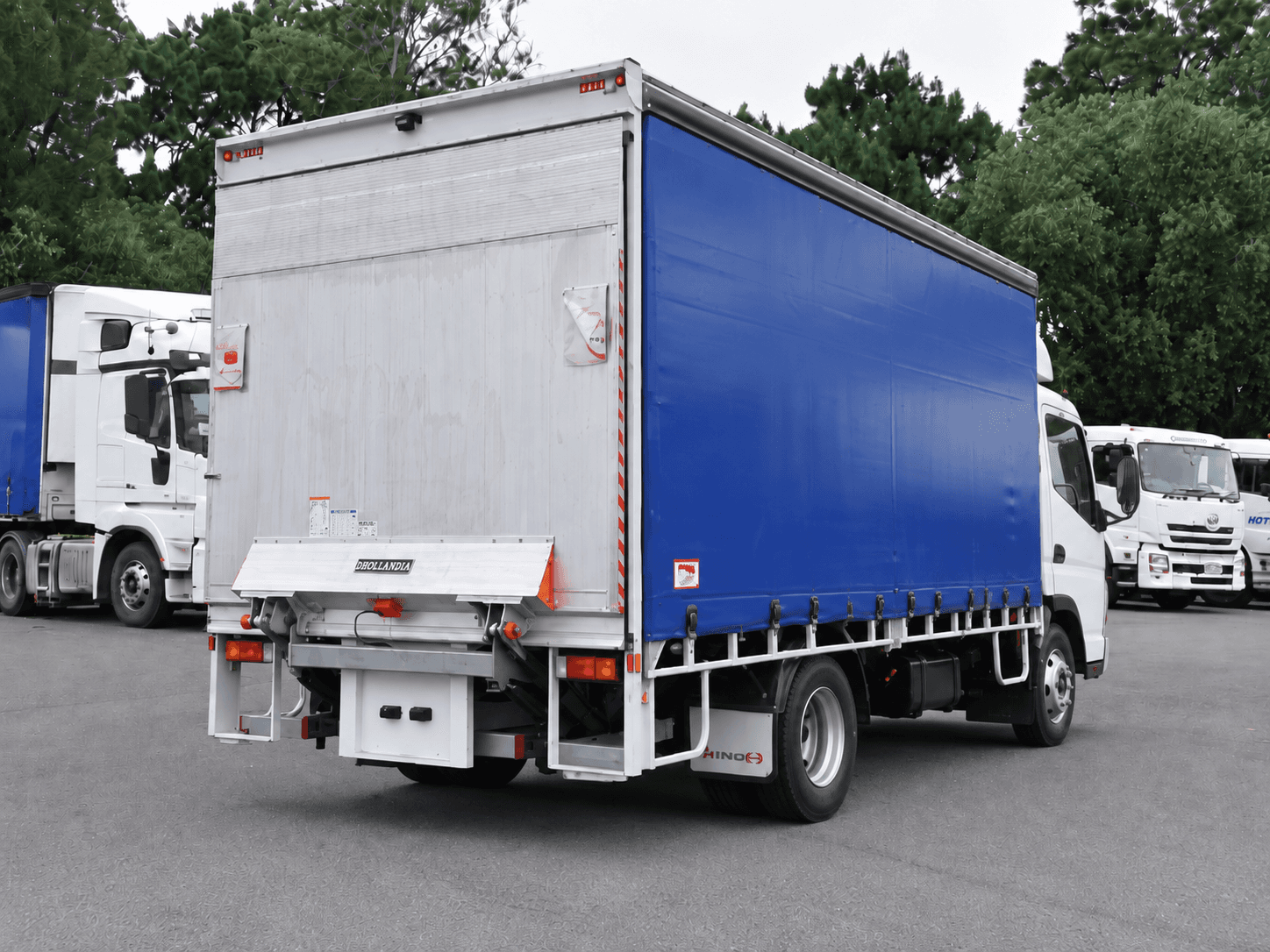 Rear view of a Medium Rigid truck showing tail lift equipment for kerbside loading