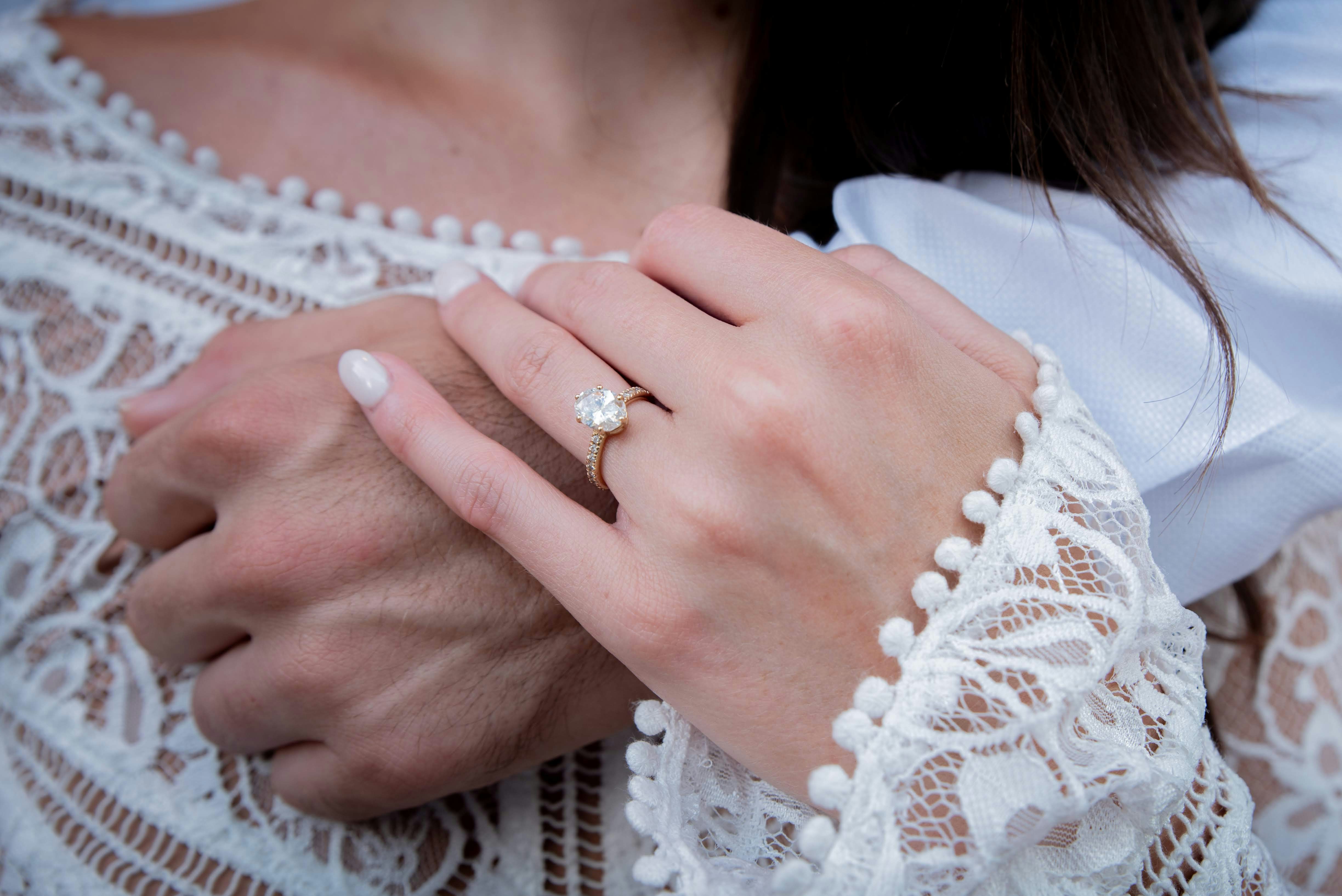 Girl getting Engaged - Fall Engagement Photo Outfits