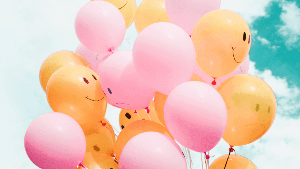 smiley face sad face balloons