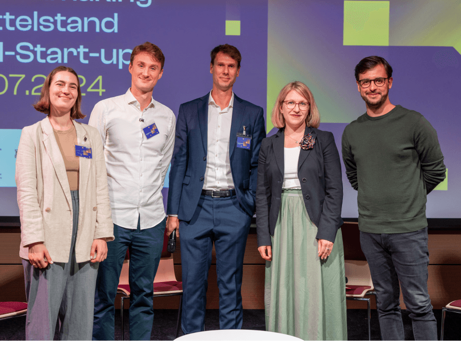 People at the conference on stage