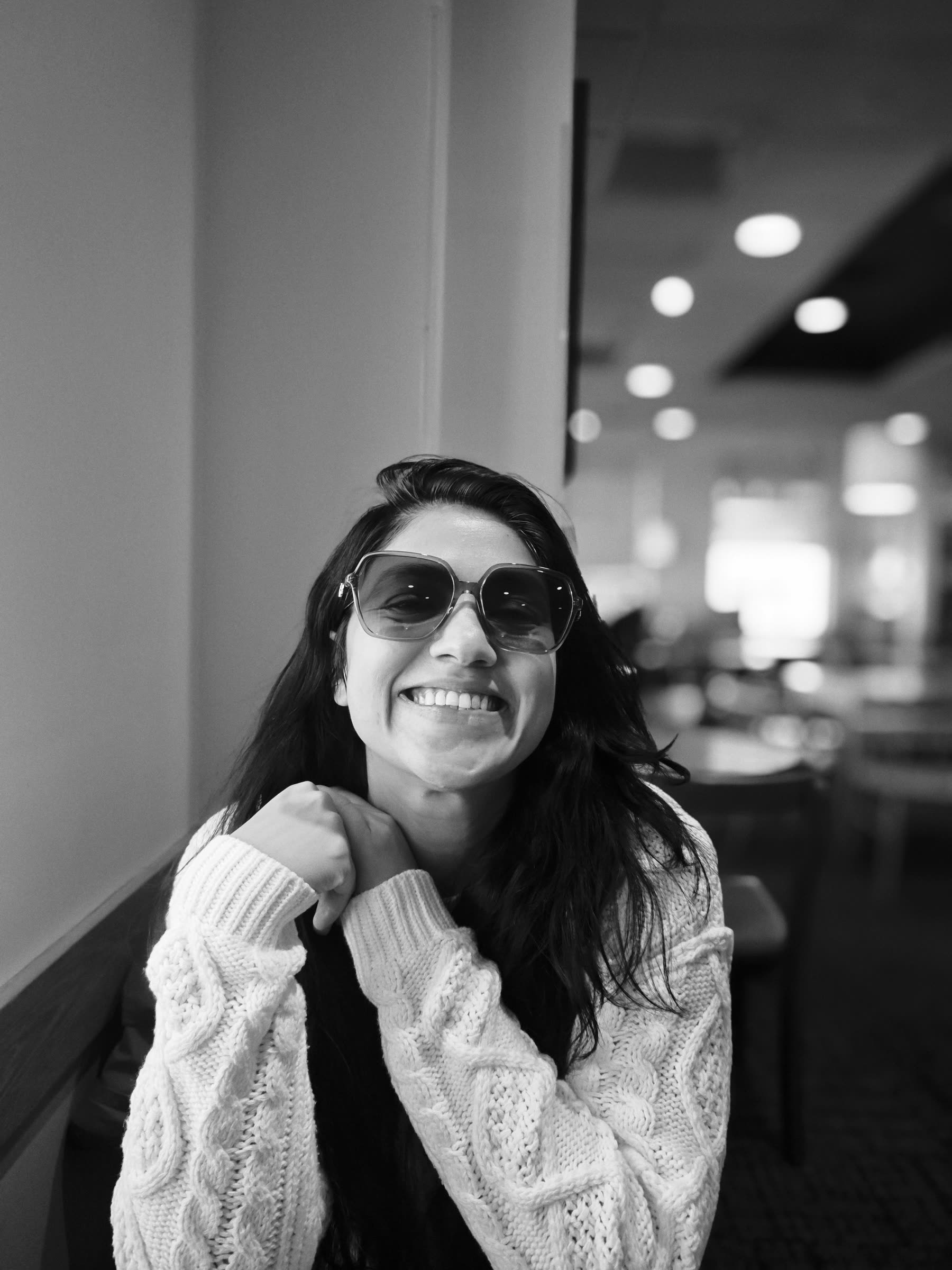 Black and white portrait of Sarika smiling