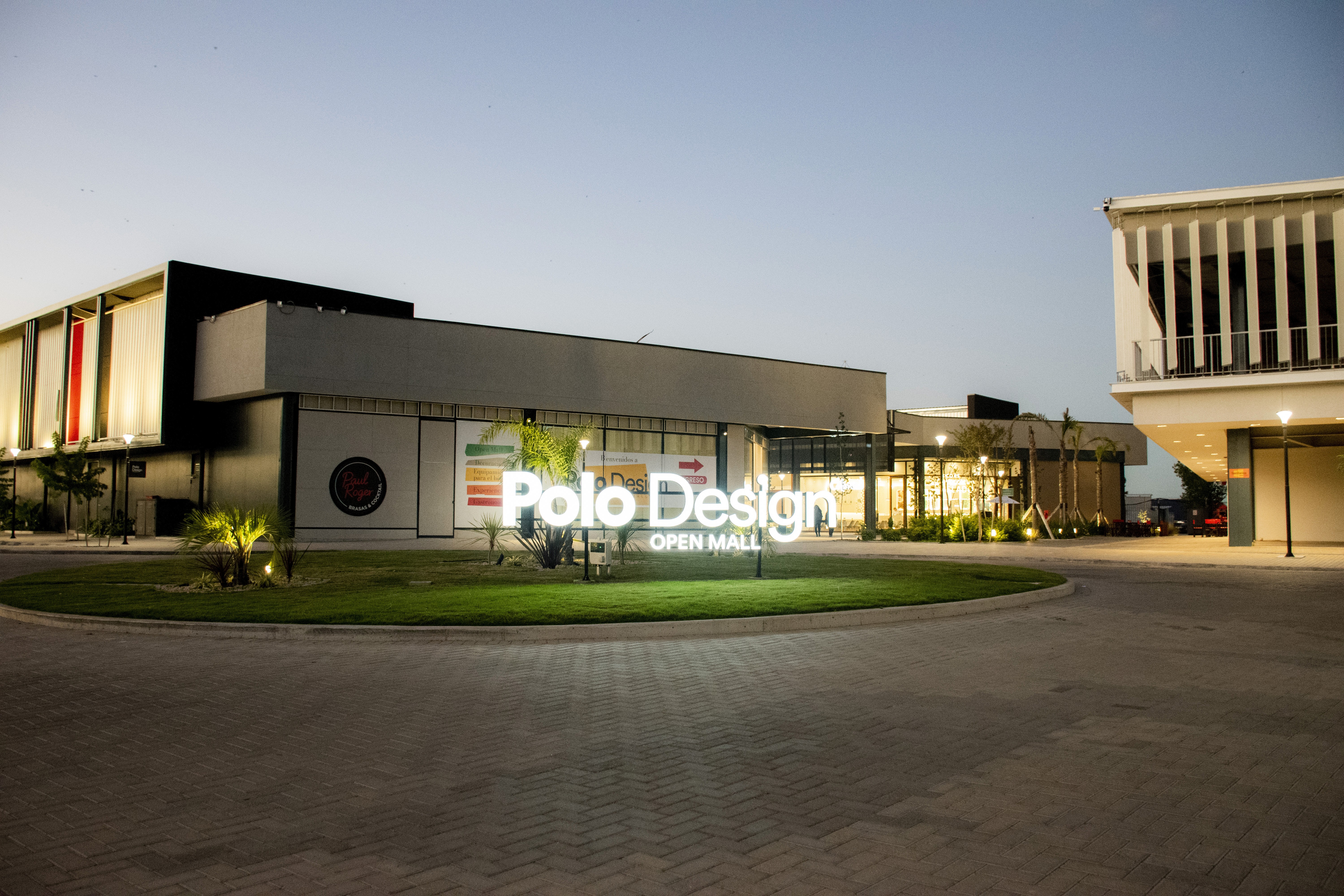 A curved facade covered in white latticework