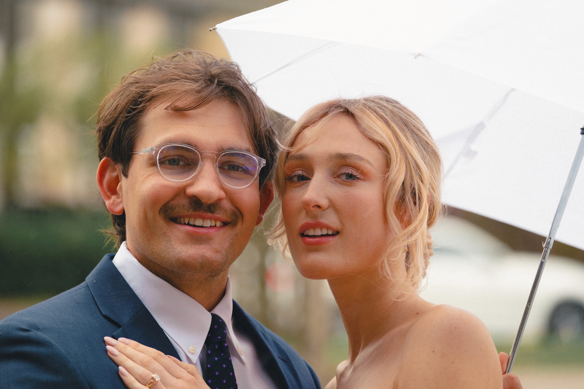 Couple smiliing at camera