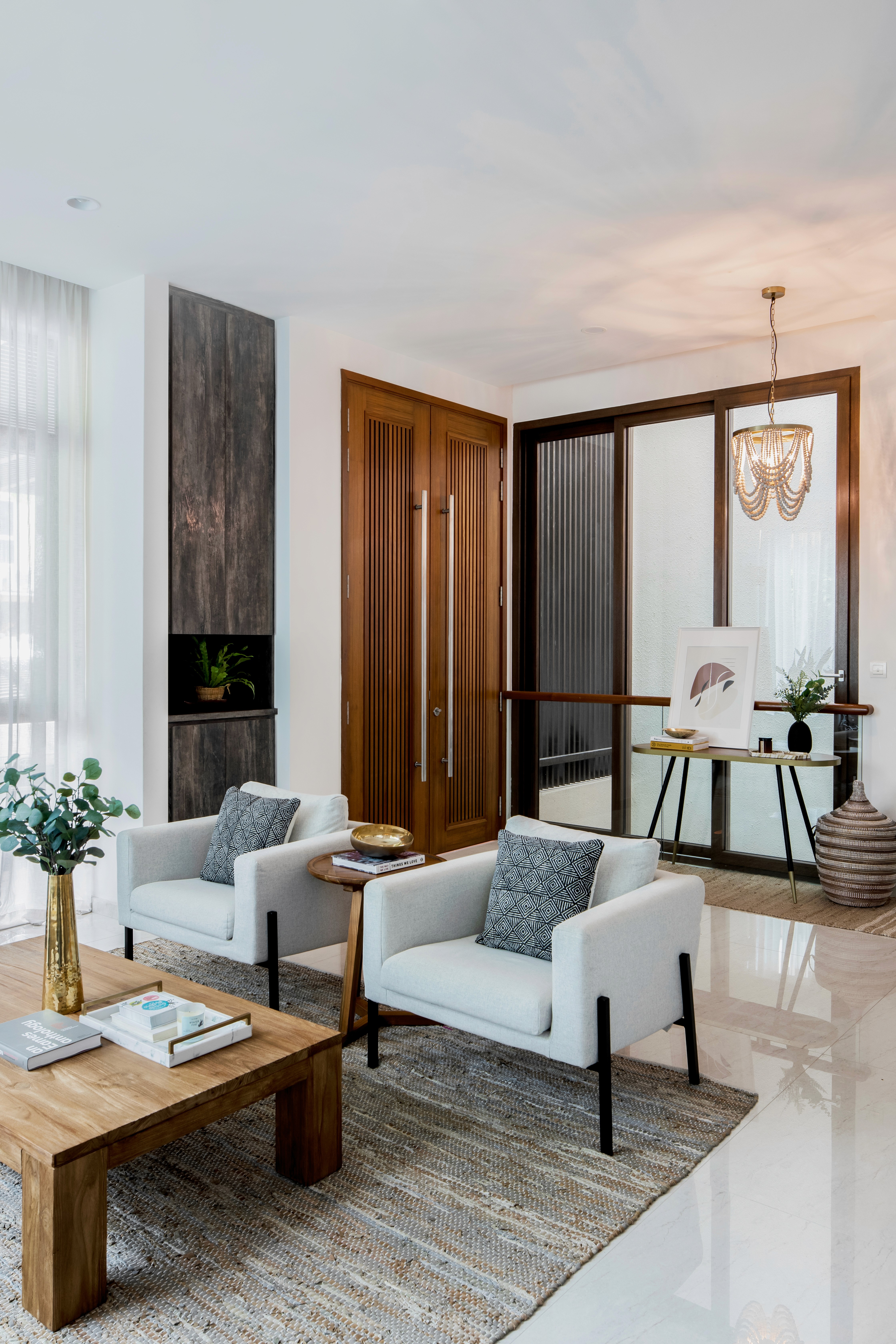 Boho chic living room chairs and entryway by Ventura & Los Angeles interior designer Jubilee Interiors