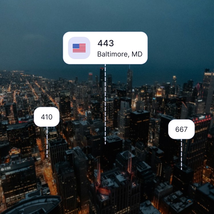 City skyline of Baltimore showing the 443 area code and surrounding area codes