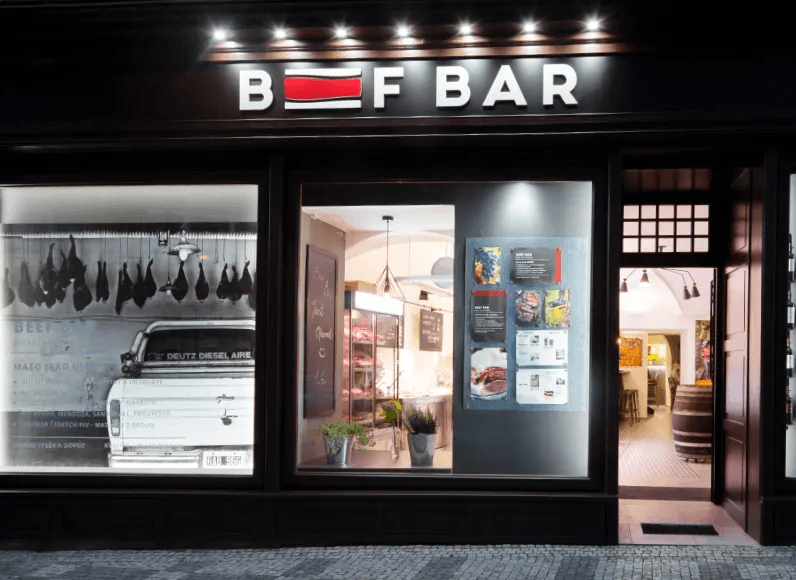 Beef Bar wordmark and meat-cut detail applied to the restaurant environment