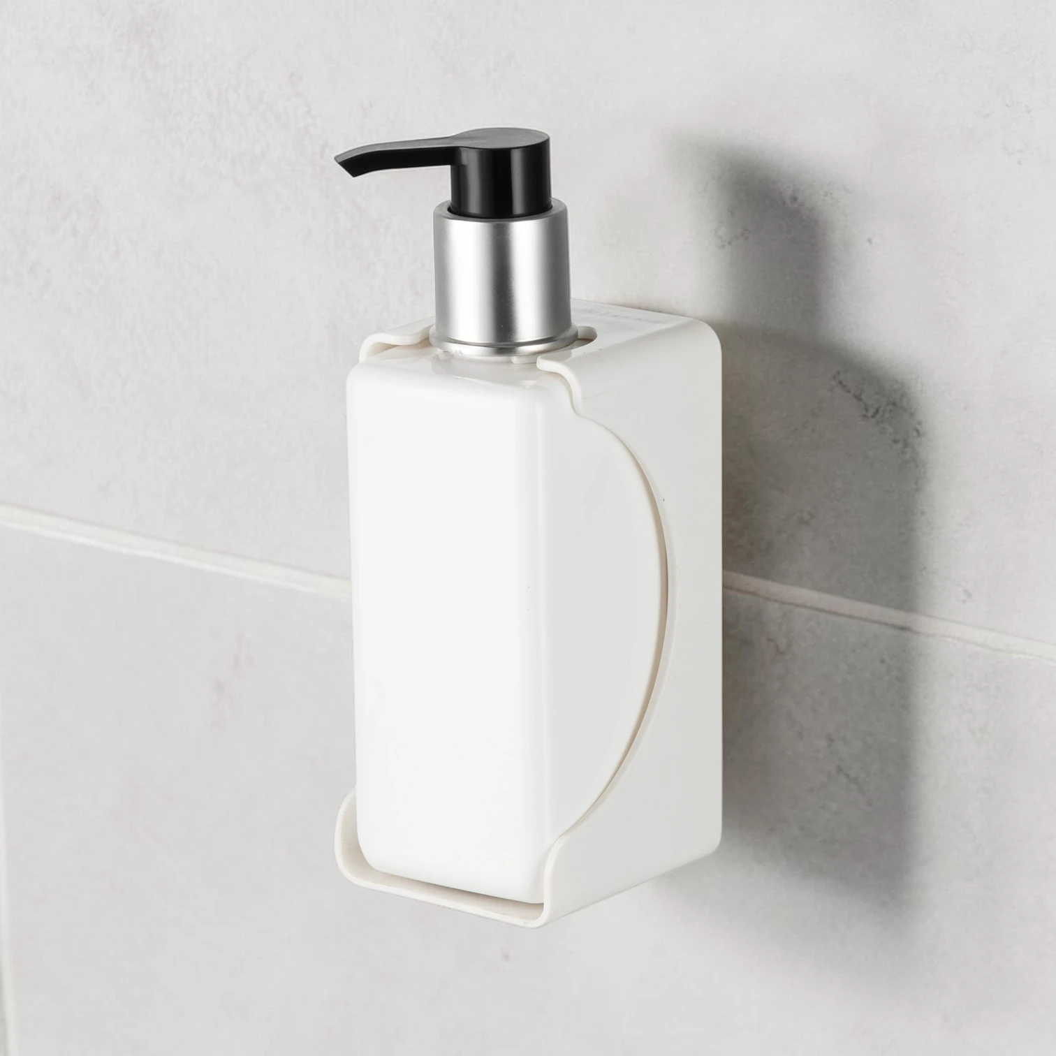 Eco-friendly tamper-proof soap dispenser bracket for hotel refillable systems, high-quality stainless steel, compatible with 300ml-500ml bottles.