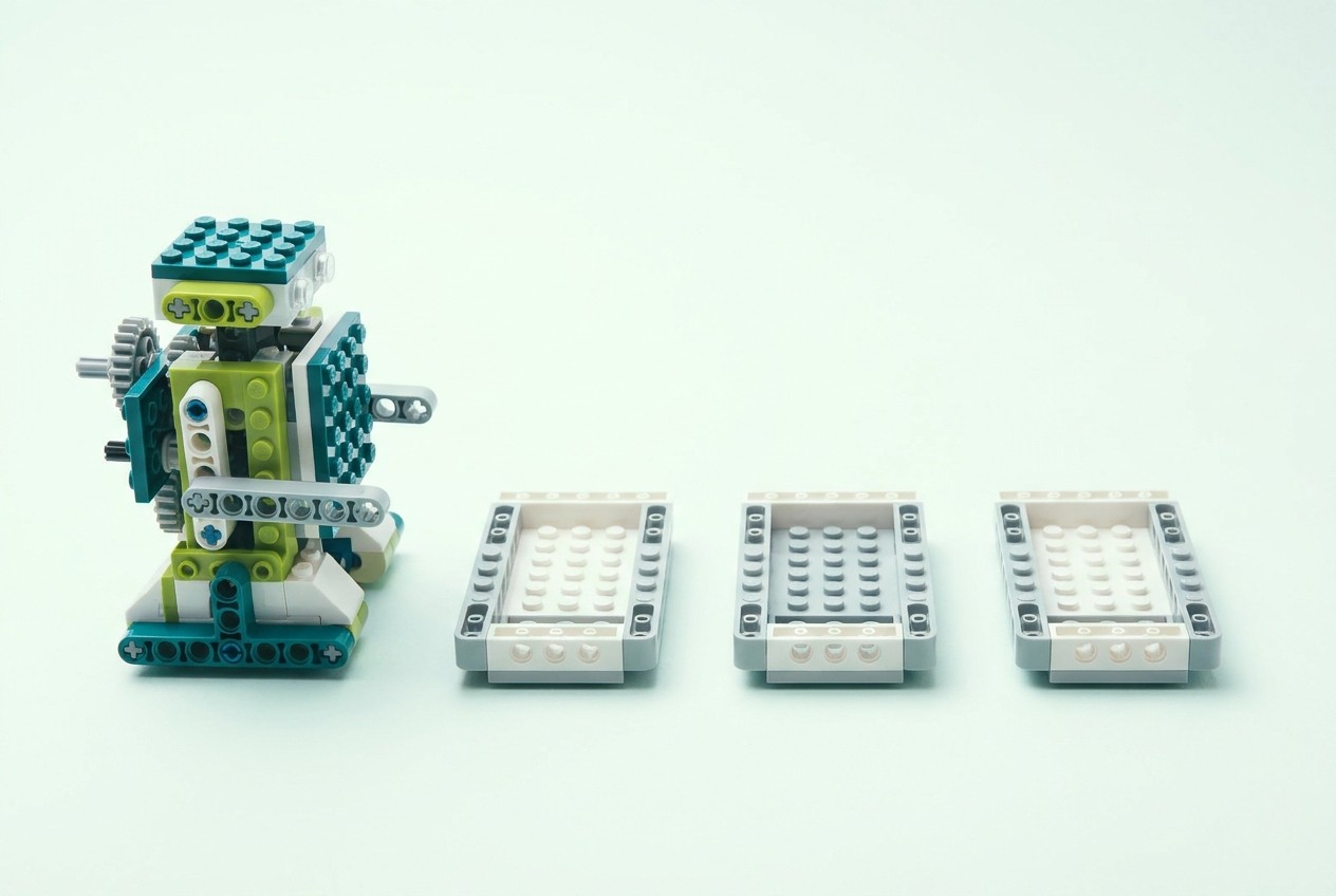 A single robot on the left with three empty mounting plates waiting to its right