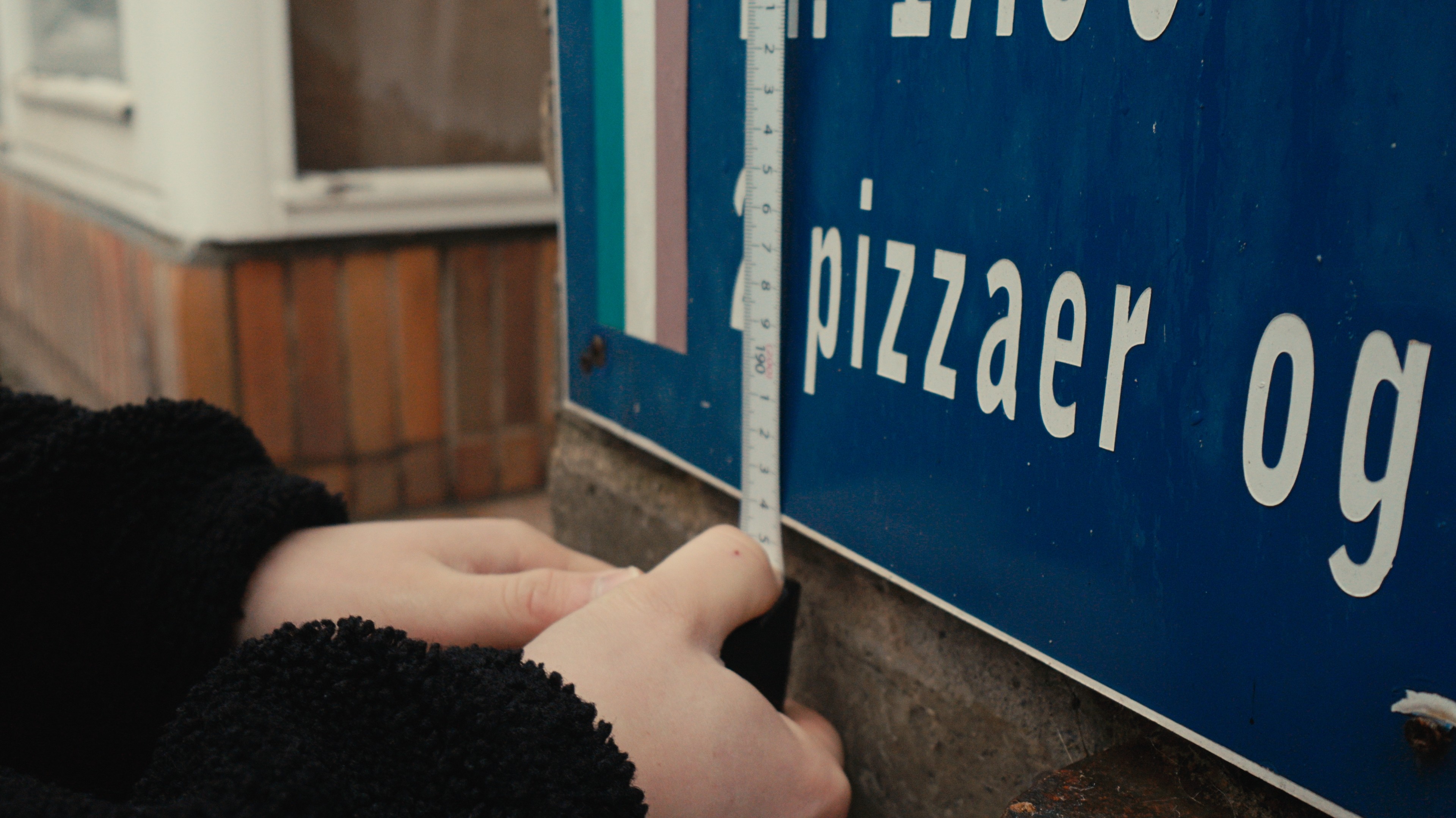 white ceramic mug on brown wooden table