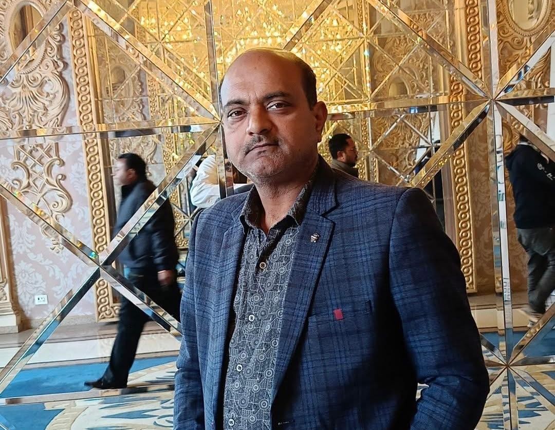 man wearing white V-neck shirt