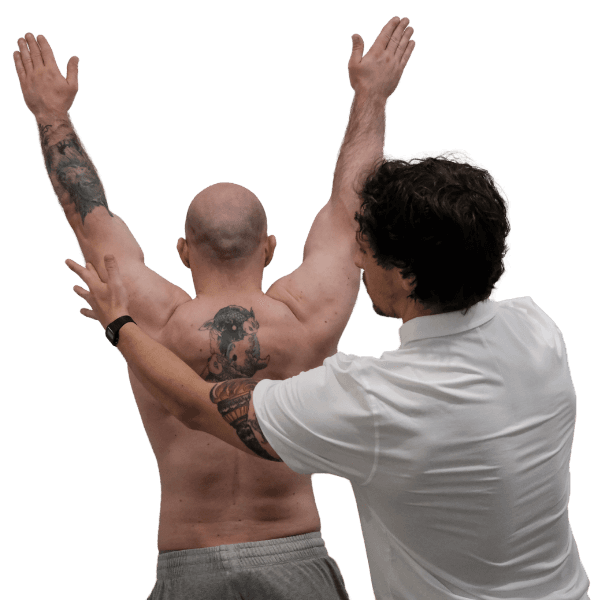 physiotherapist assessing a paitent's shoulder range of motion