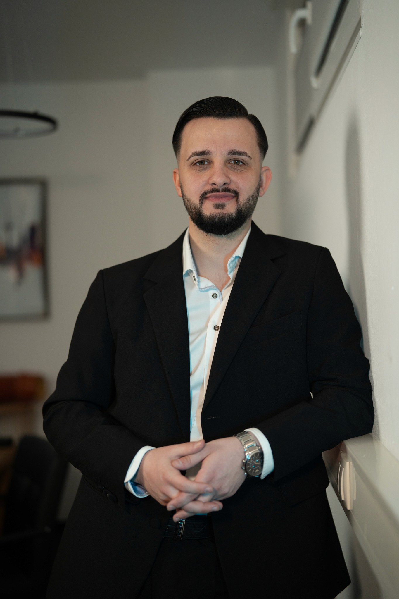 Team member presenting in front of task board, representing collaborative planning.