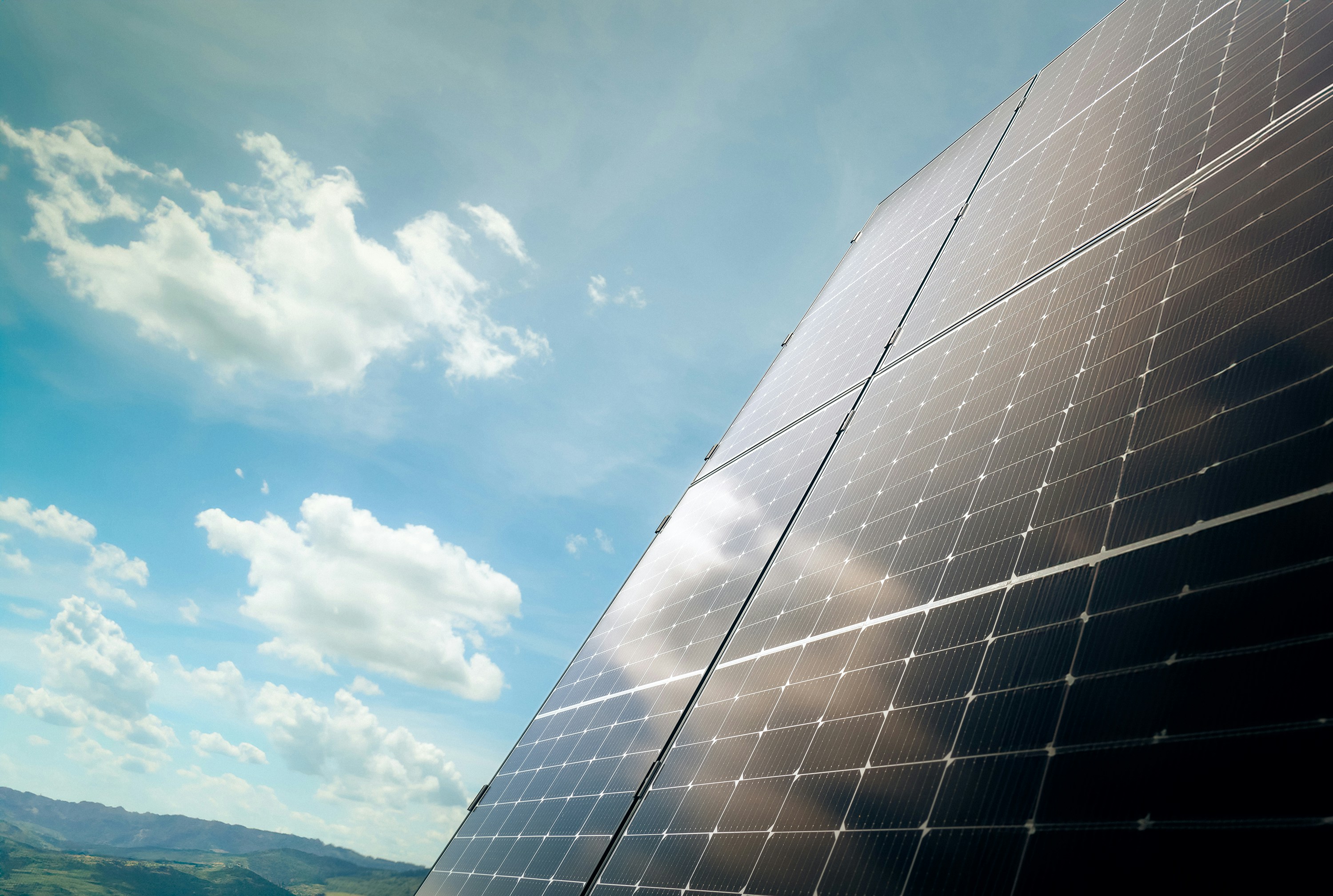 solar panel with blue sky and white clouds