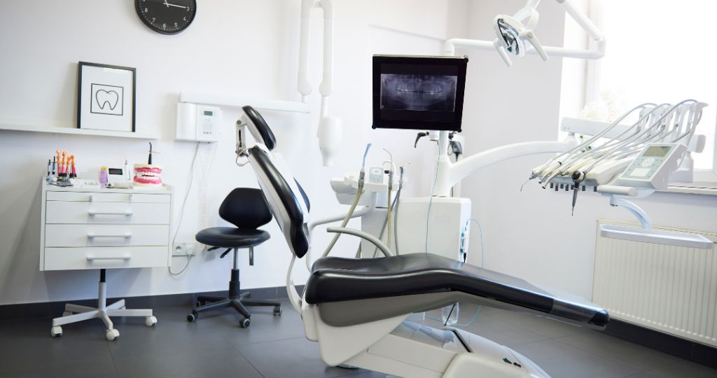 Modern medical aesthetic clinic with dental chair and equipment