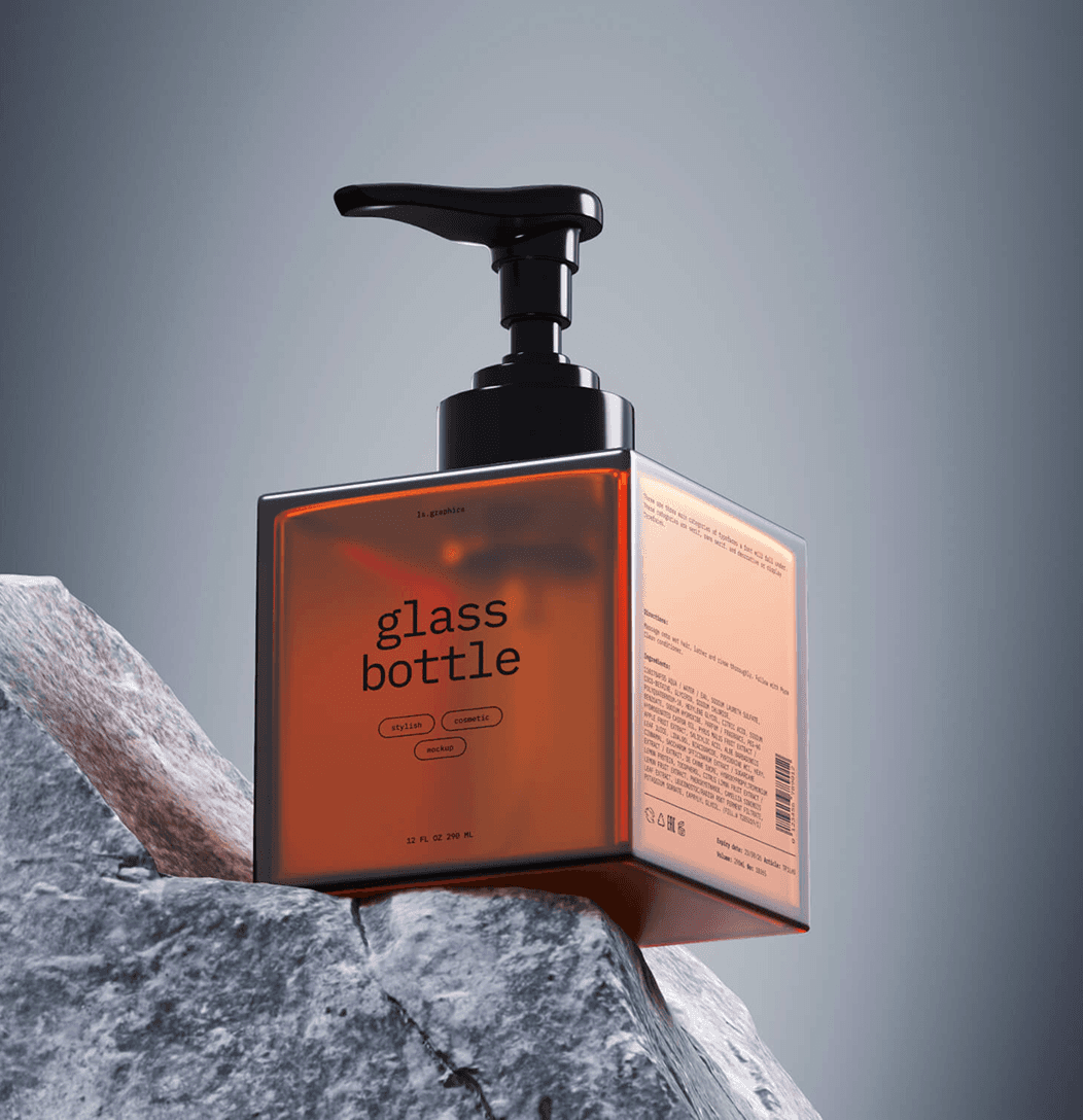 A glass bottle resting on a rock, showcasing its transparent design against a natural backdrop.