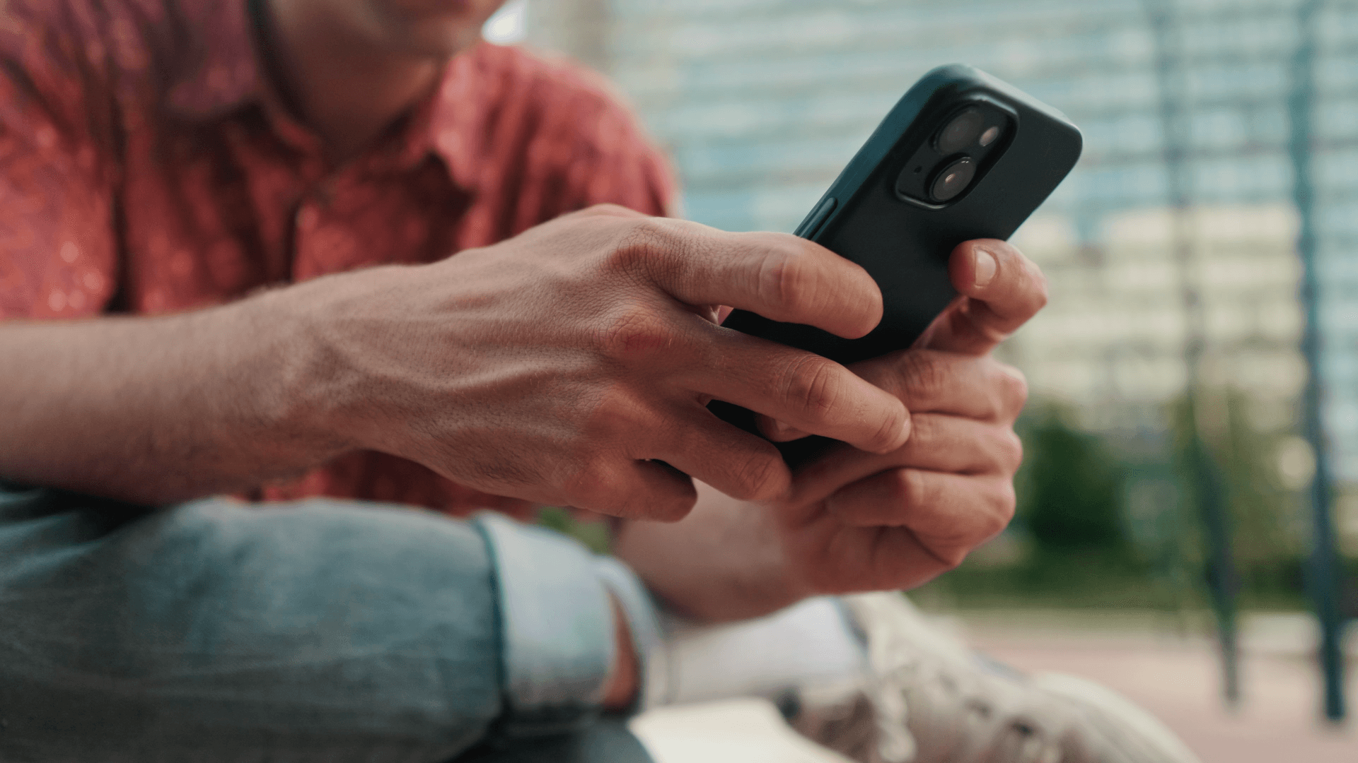 Man using his phone.