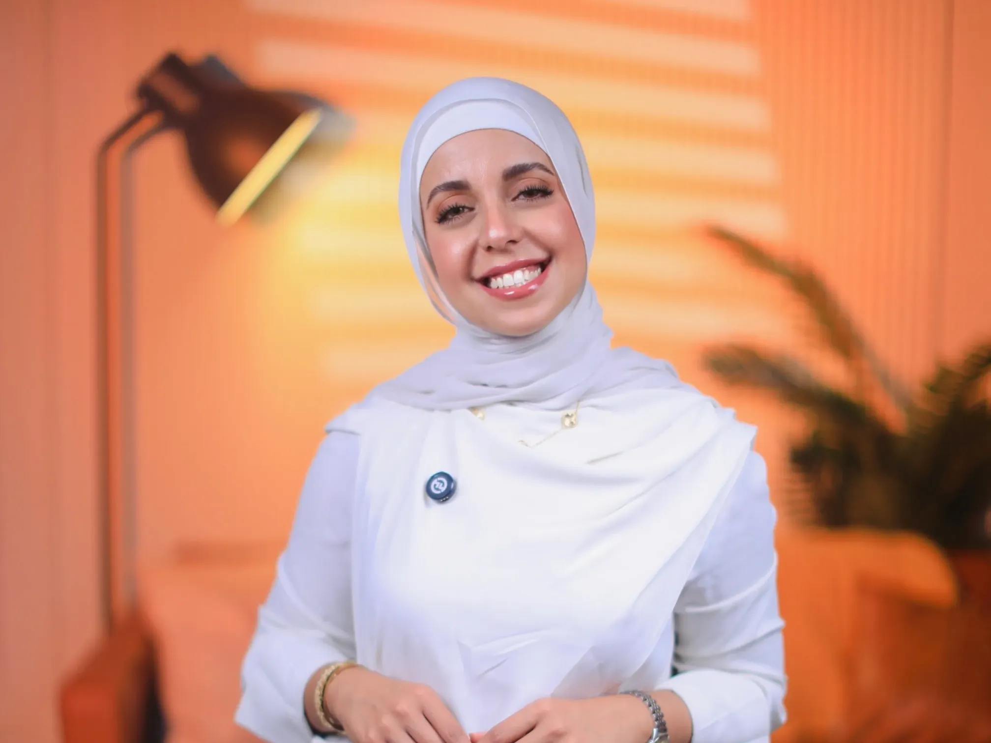 Asmaa A-Khaldi giving her insights in a video from her studio