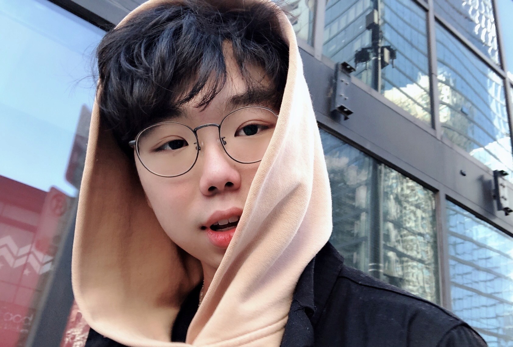 a blurry photo of a person standing in front of a wall