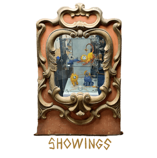products portfolio section button, with image of an antique carrousel frame containing Sage's hand holding Celestial Wards Series themed playing cards, featuring celestially themed orange, blue, and yellow cards and illustrated diamond suit face cards