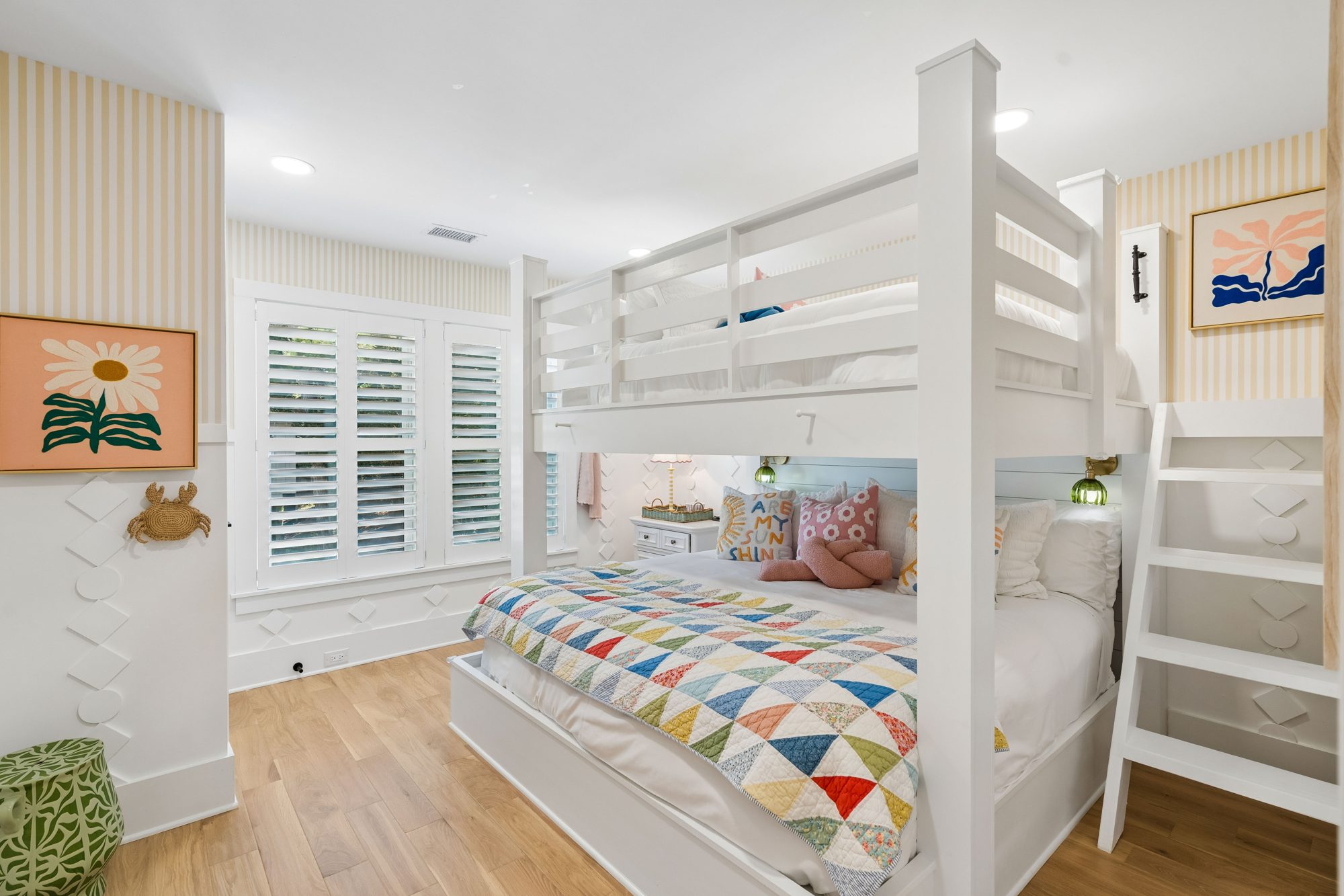 Bedroom 4 queen-over-king bunk with striped wallpaper