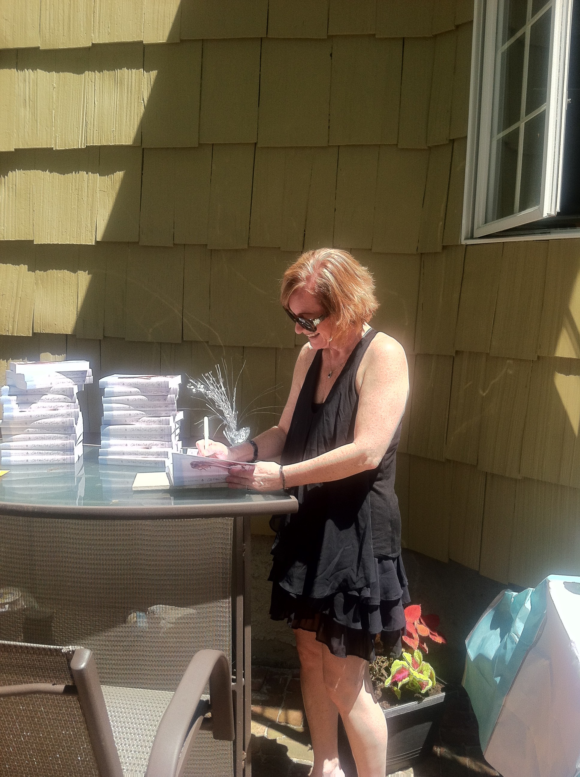 Author signing her book