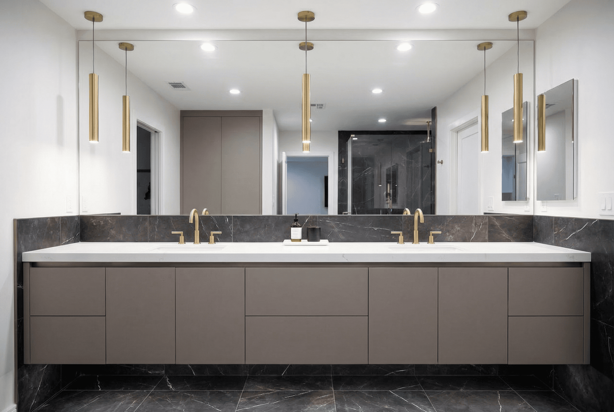 a bathroom with a toilet, sink, and bathtub