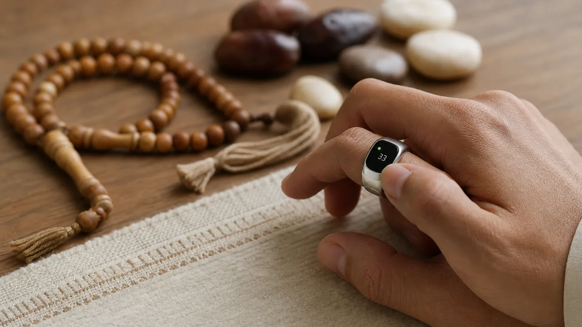 A zikr ring, prayer beads, and date stones showing dhikr counting aids
