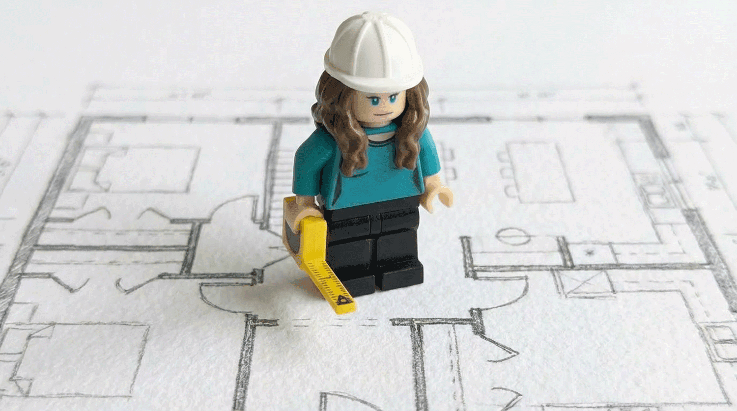 Interior of a cafe or workspace with several people at tables