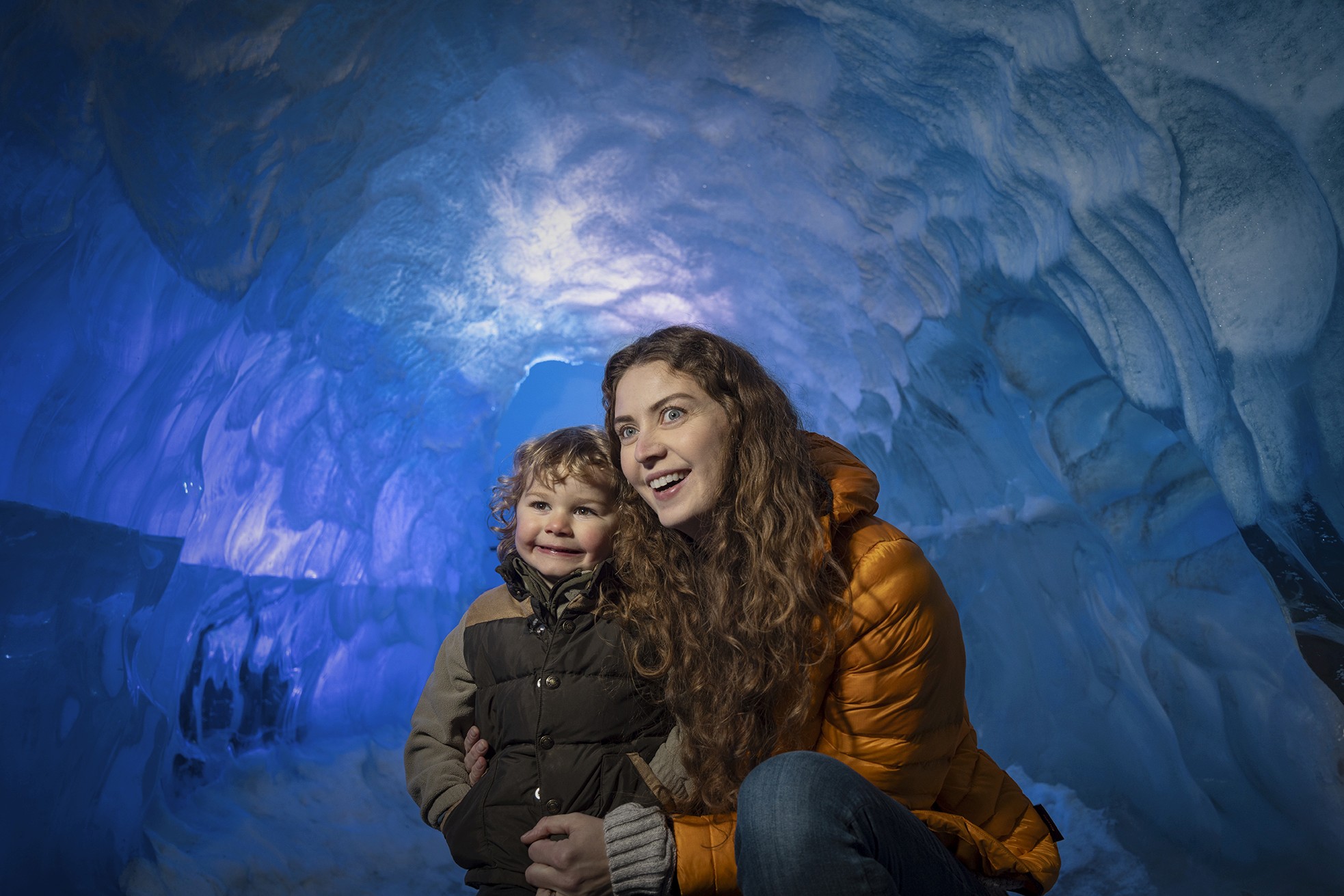 mom and son in ice cave in reykjavik