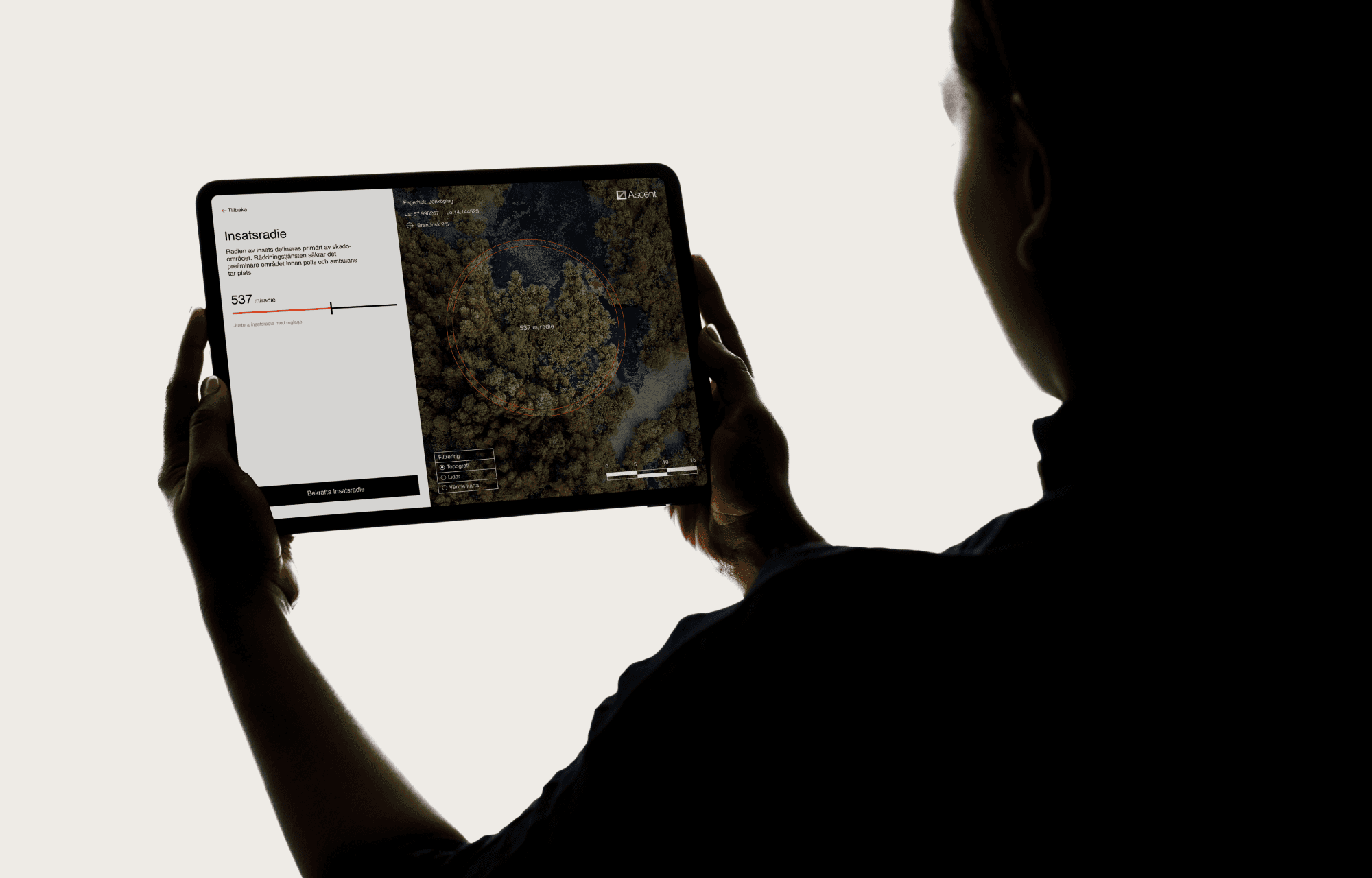 person holding ipad ascent UI