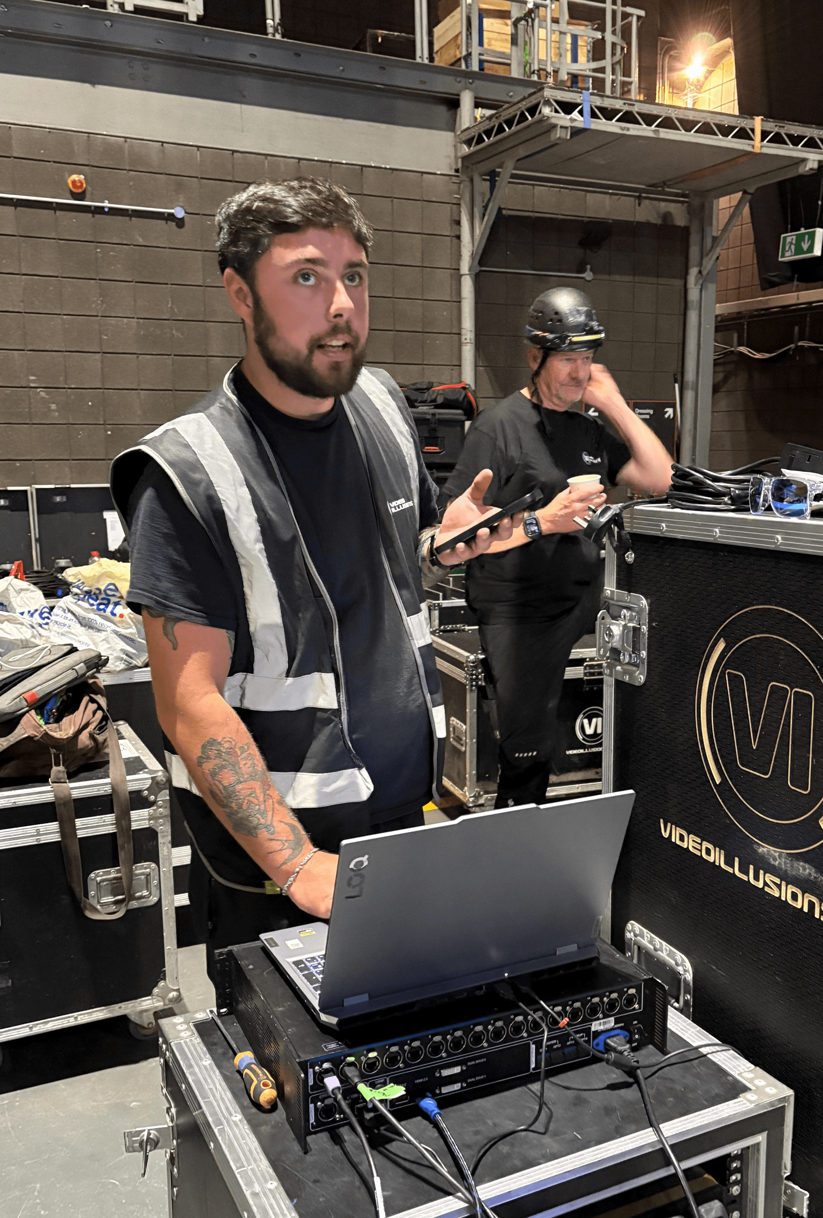 man in gray hoodie wearing black hat
