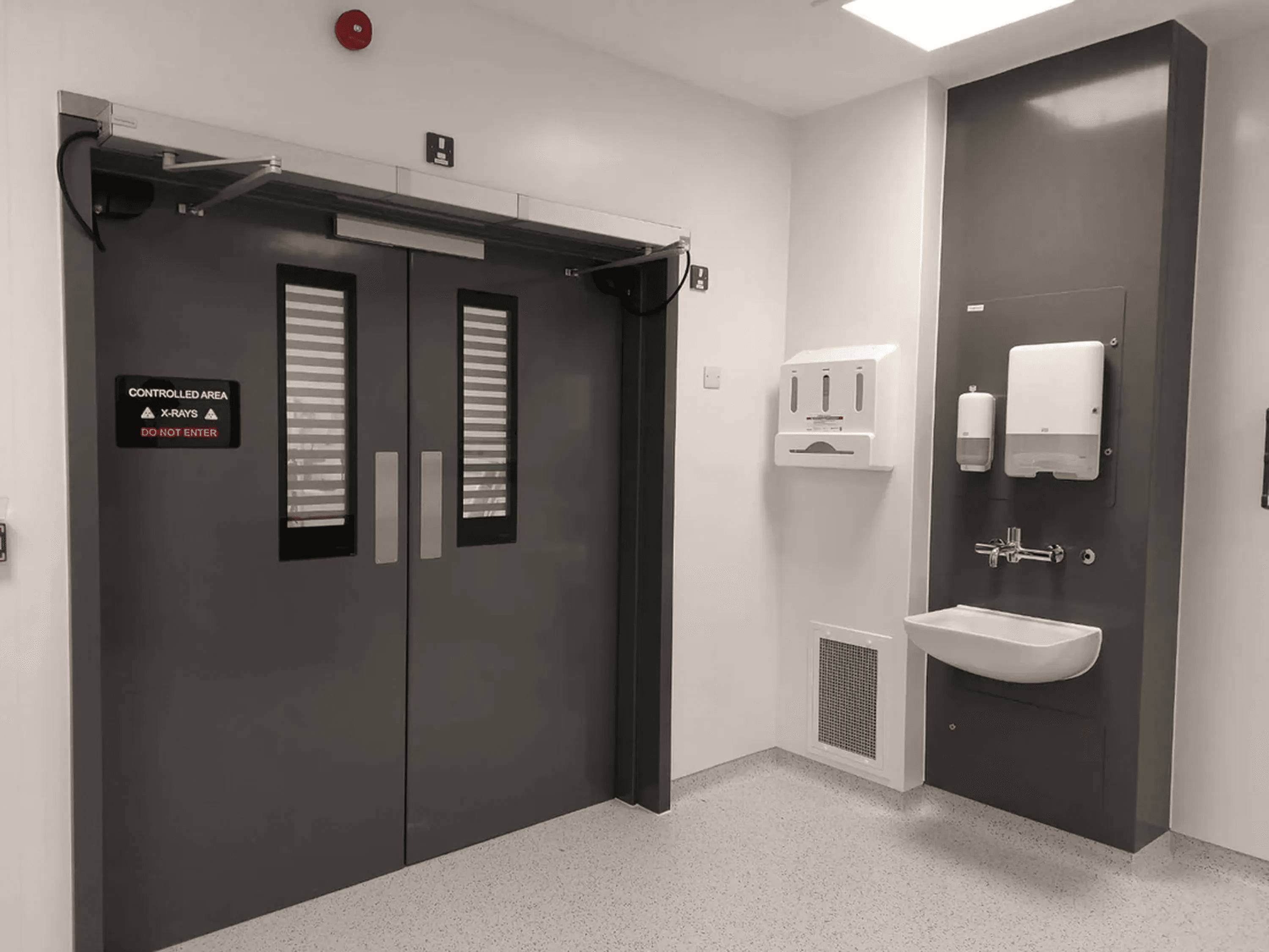 The Trovex Hygidoor and Hygipod IPS installed in a healthcare environment in hercules finish