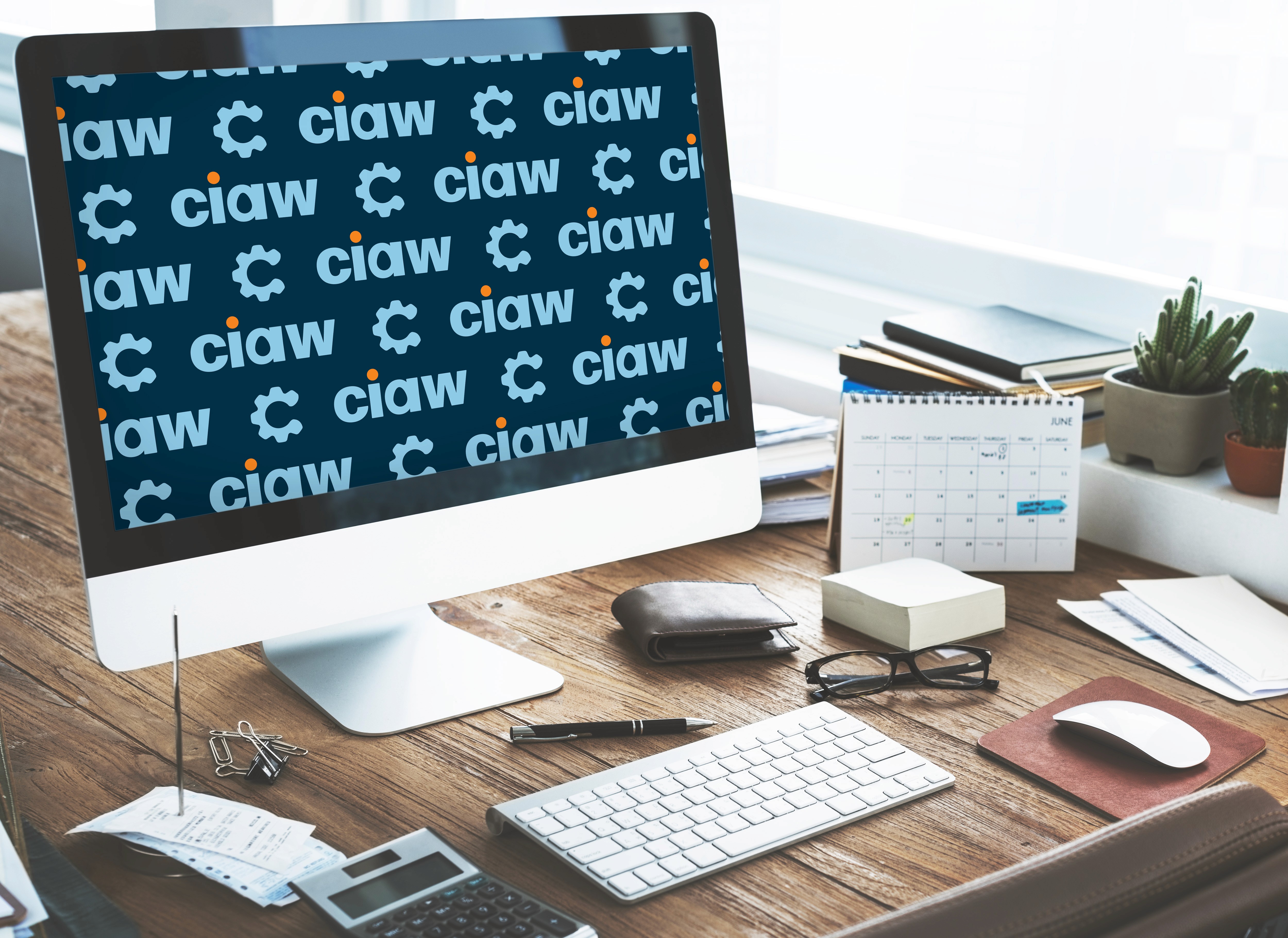 computer screen with branded background