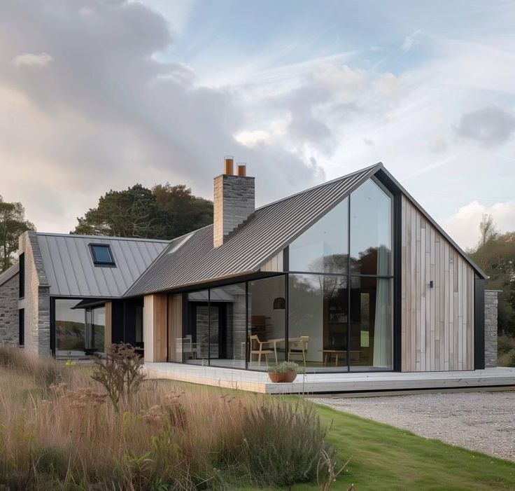 A stylish residence constructed with wood and glass, emphasizing a harmonious connection with nature.