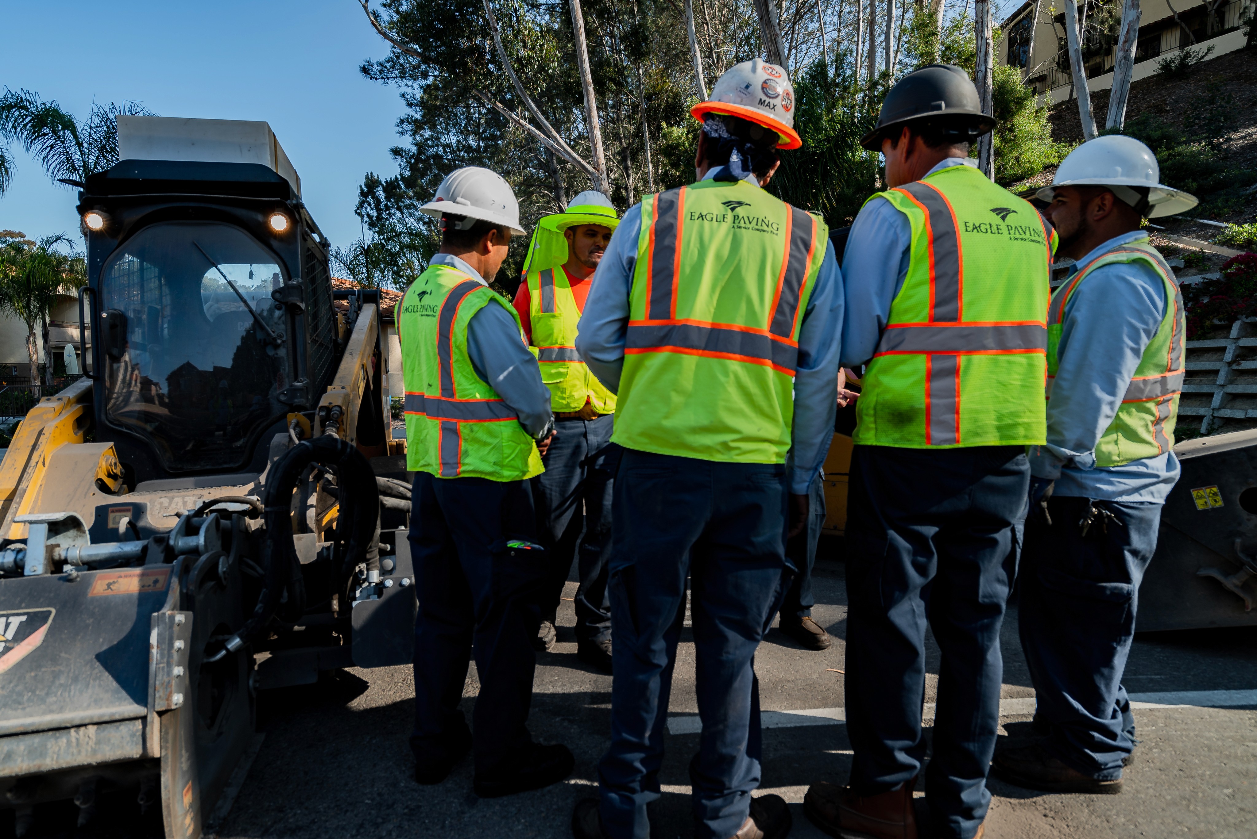 Construction crew having a safety meeting