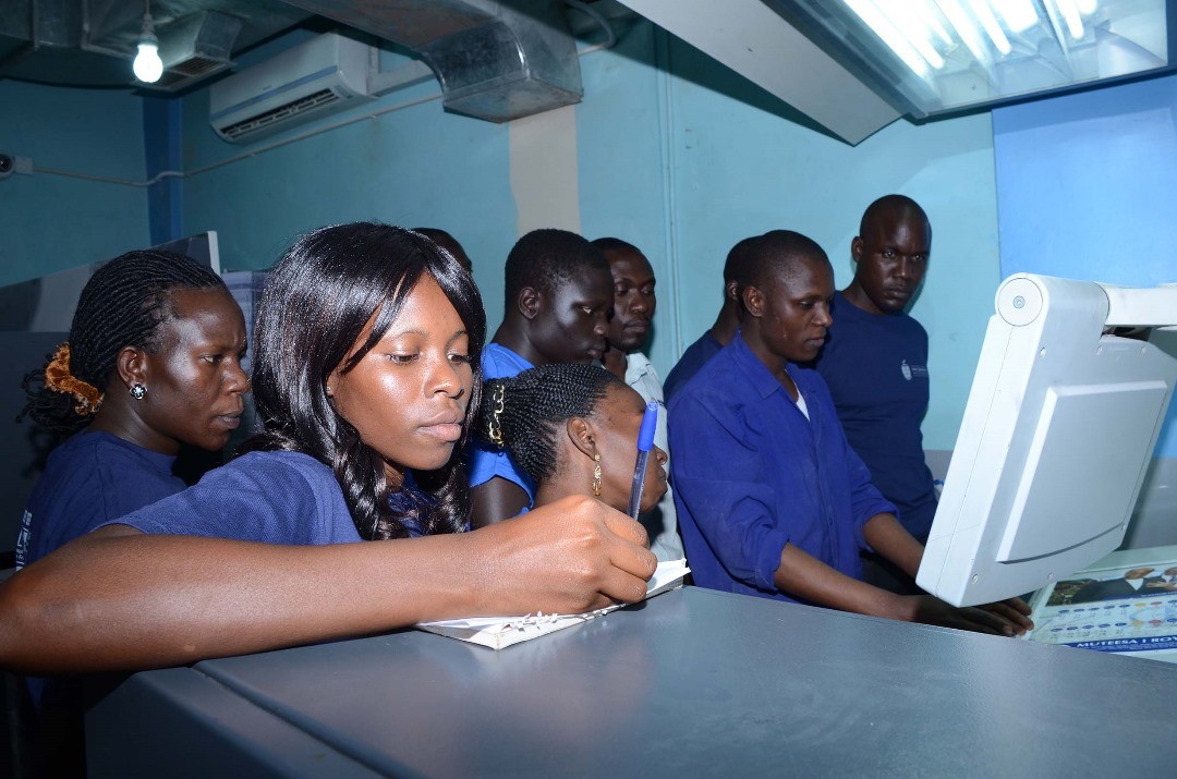 man in long sleeve shirt sitting on chair