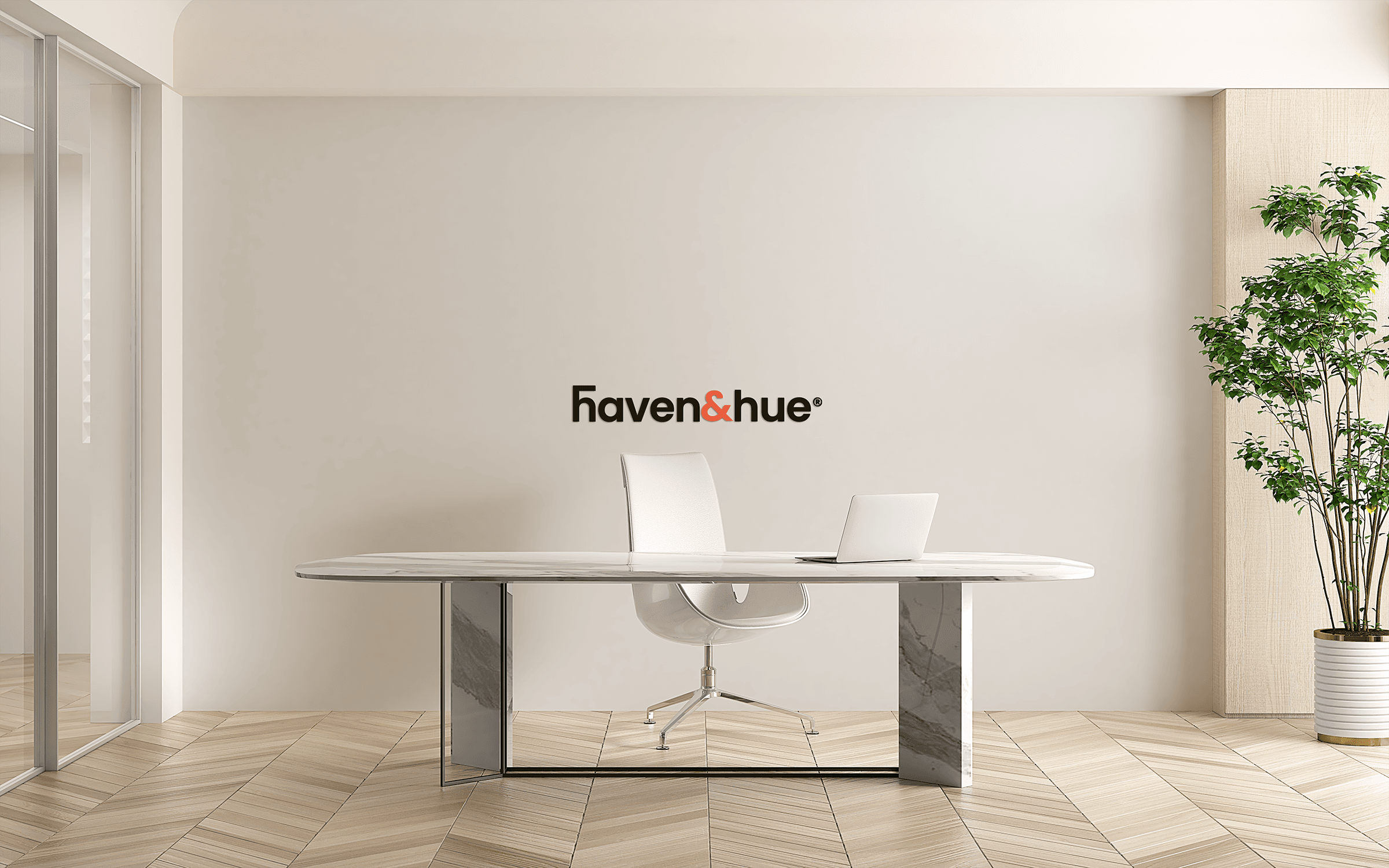 mockup of Haven & Hue's logo signage in modern office