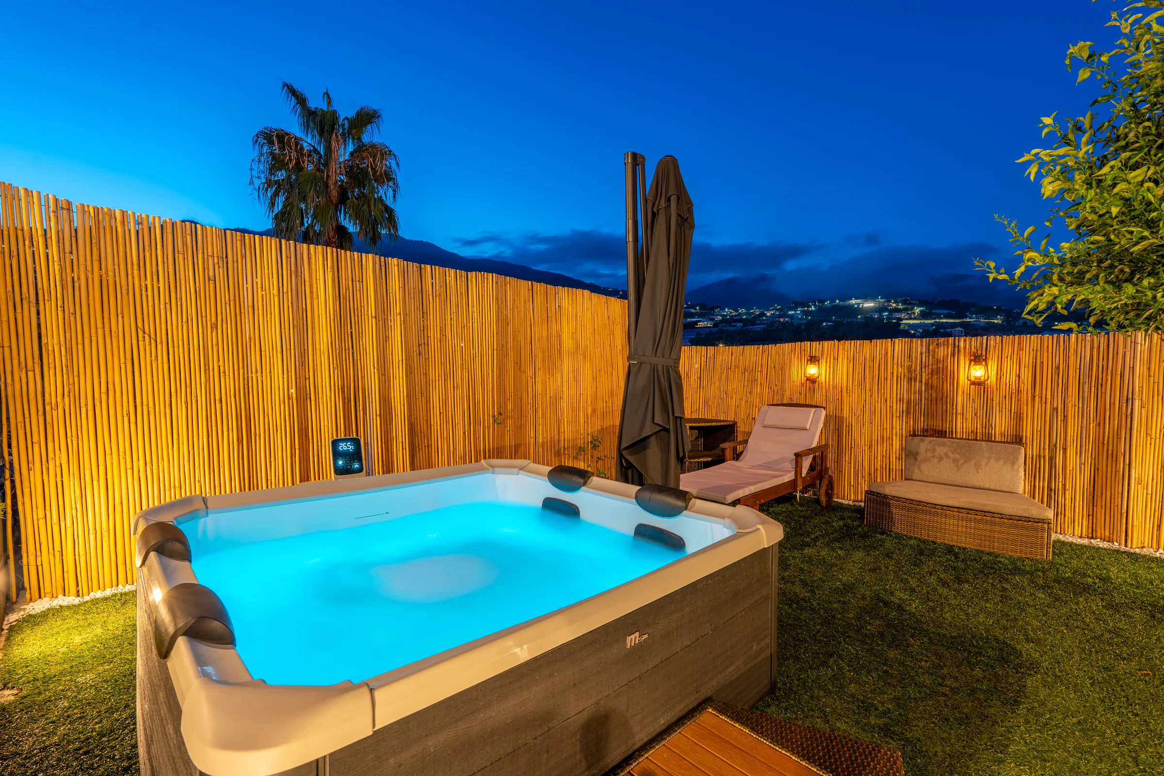 Garden hot tub at blue hour — Province of Imperia, Italy. Photography by Yunes Calore.