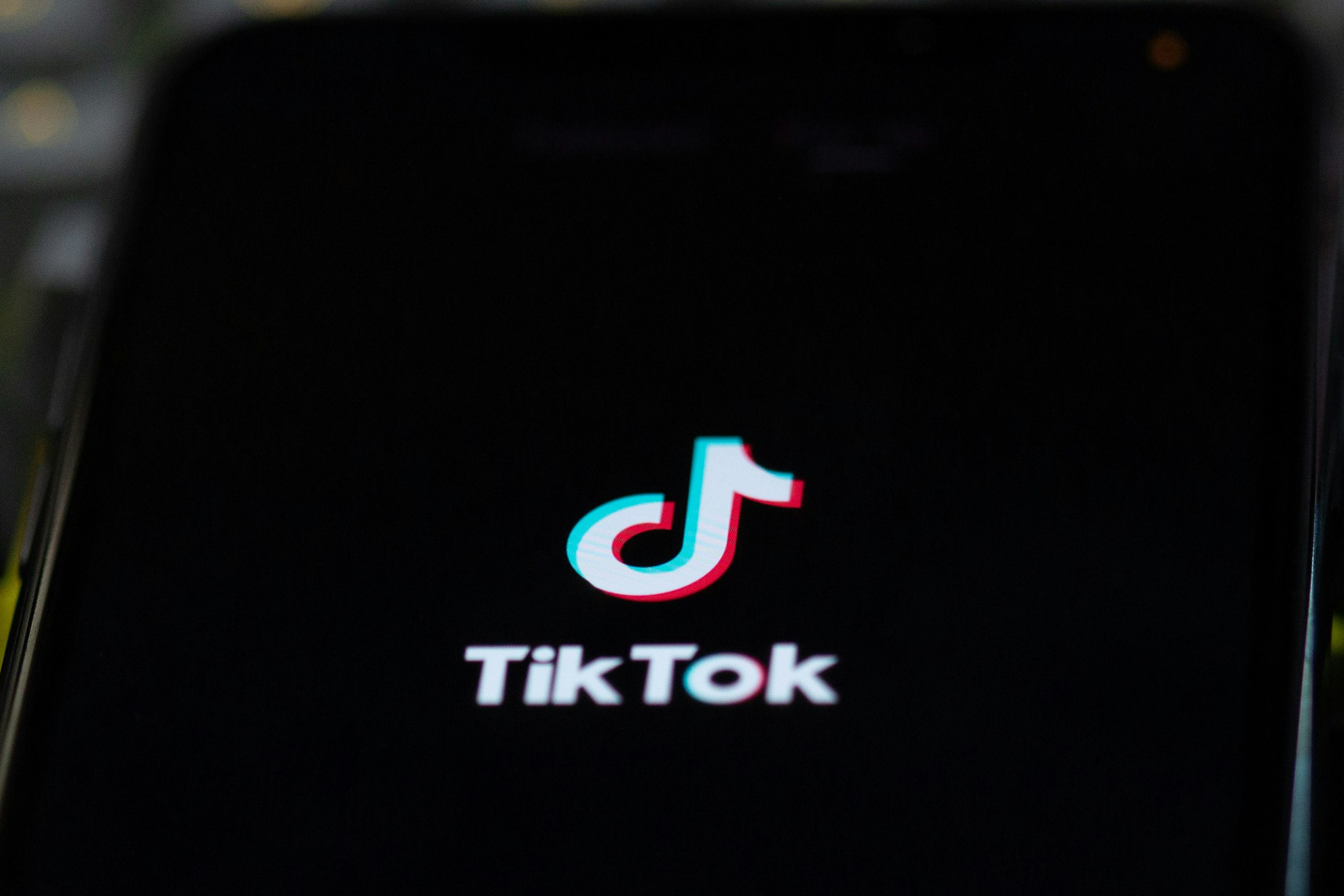 tiktok app logo on phone - Tiktok Vs Youtube Shorts