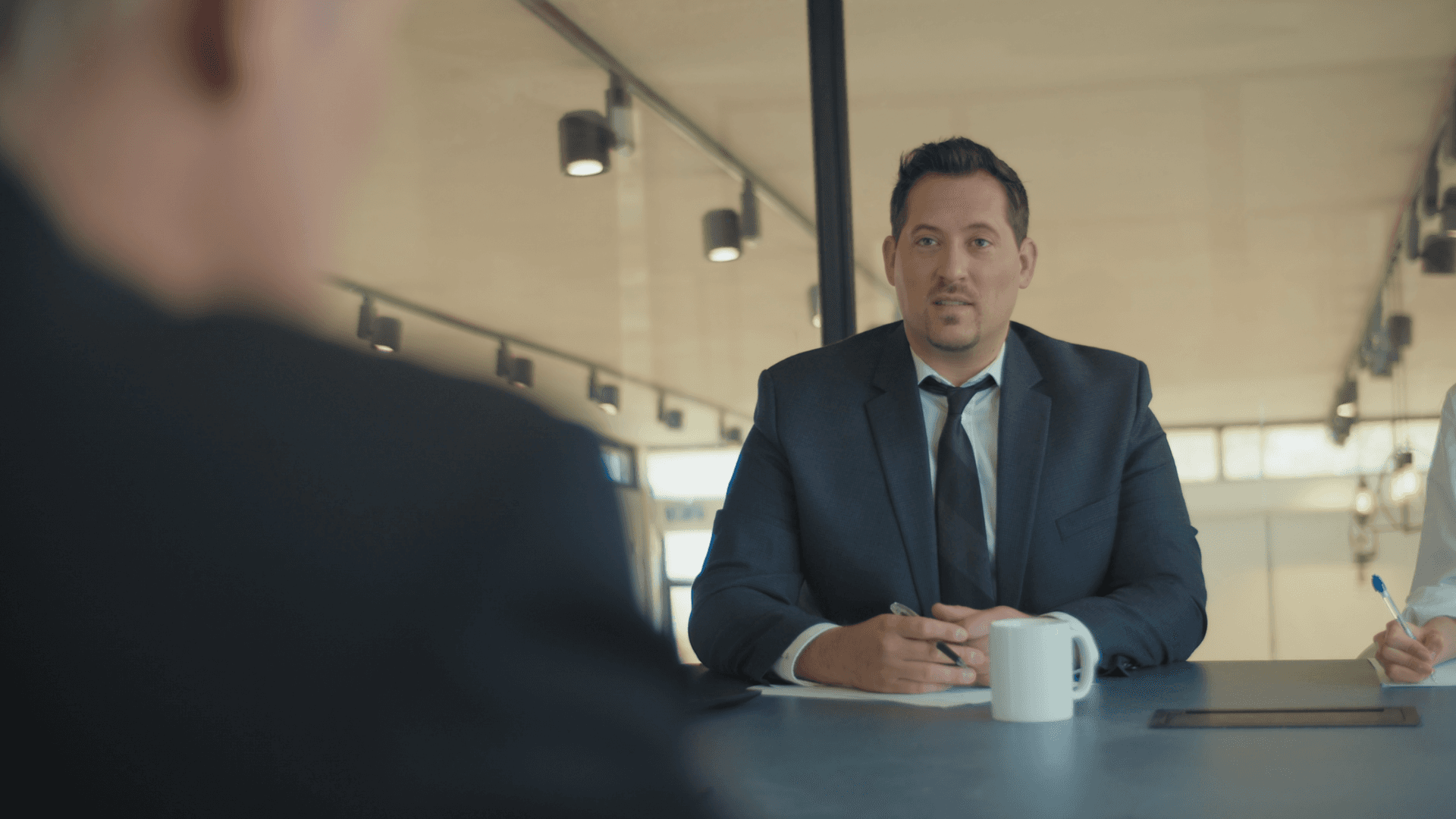 selective focus photography of woman holding camera gimbal