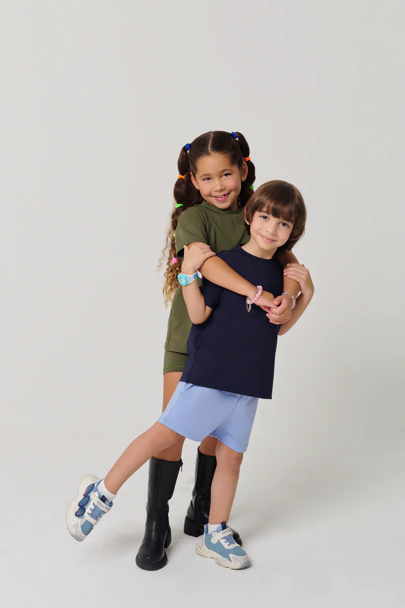 Friends laughing and posing inside a car