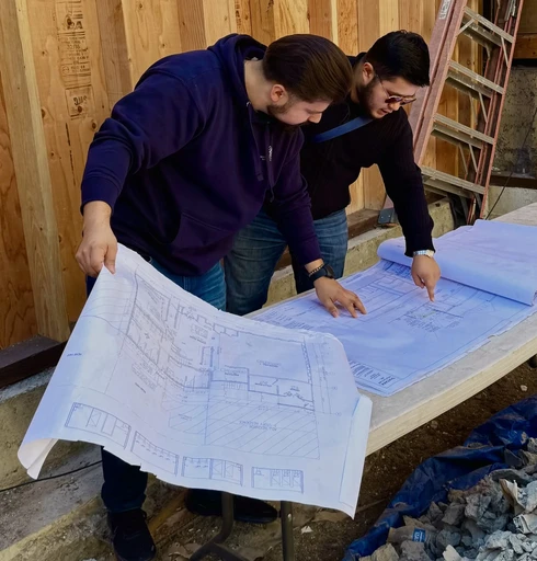 Building an ADU in Bay Area, work in progress. Examining plans before ADU construction.
