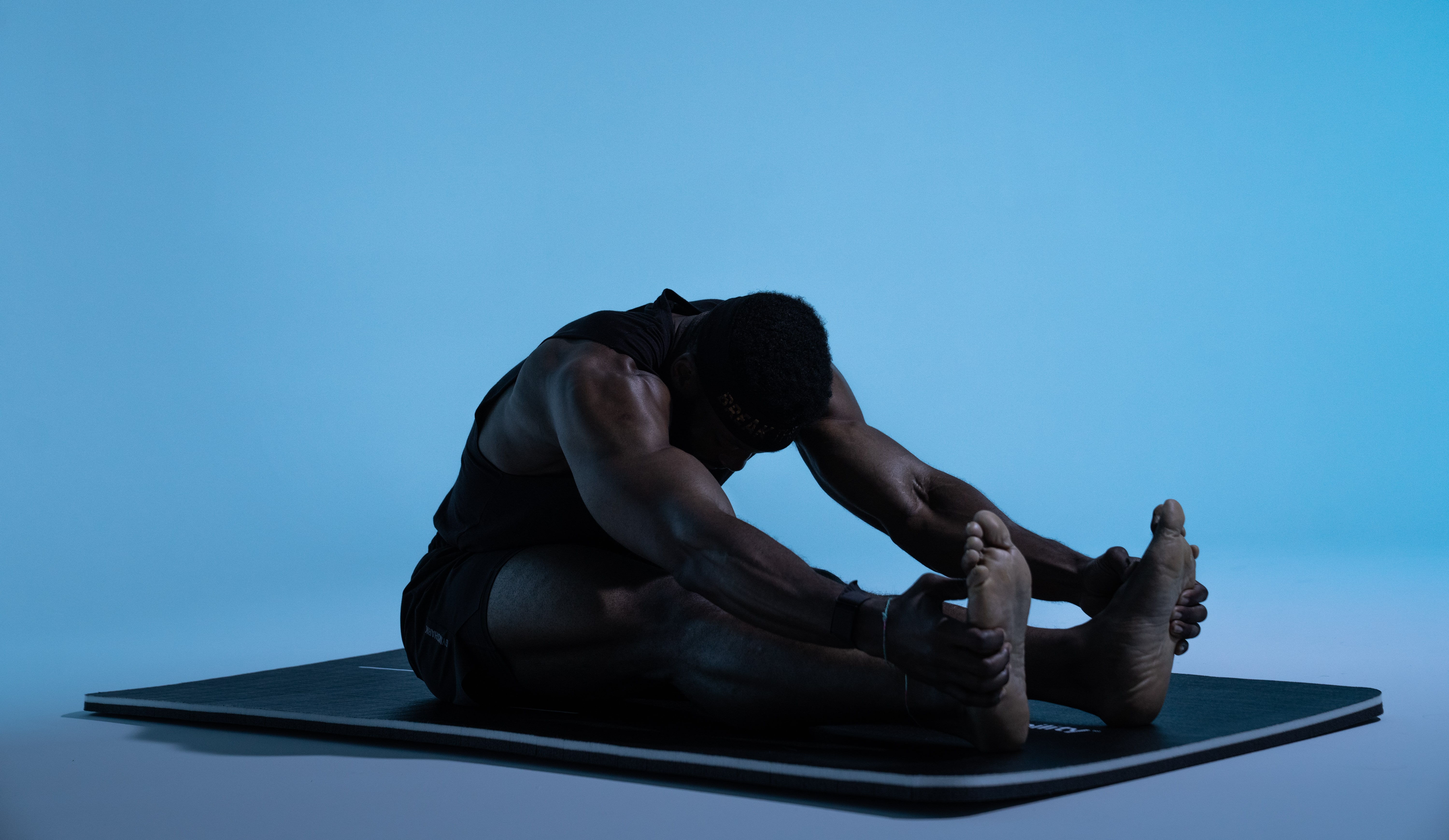 man using mat - How to Create a Personalized Workout Plan