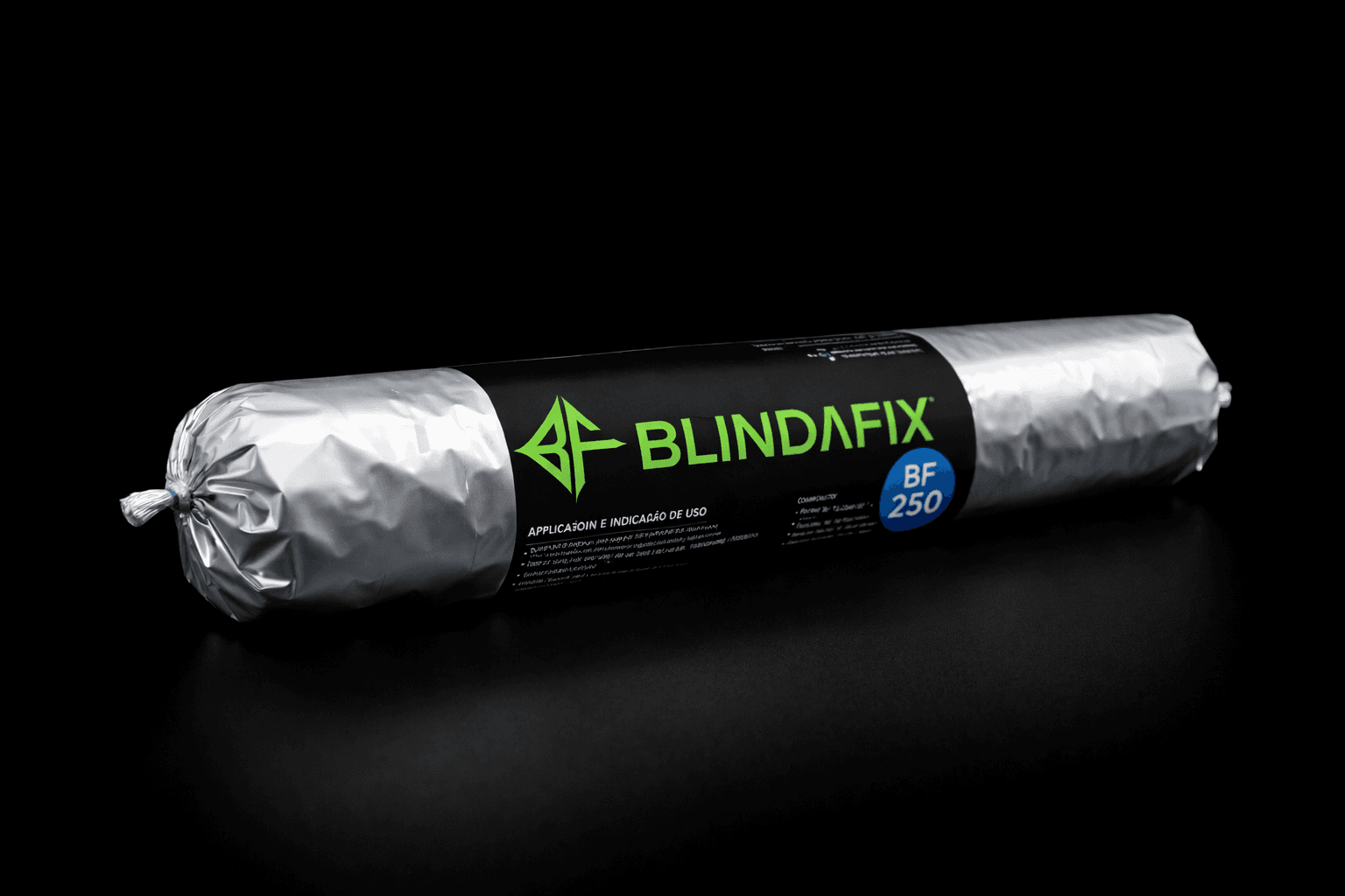 Smiling man sitting at a table with a laptop, phone, and coffee mug, engaged in a video call or online meeting.