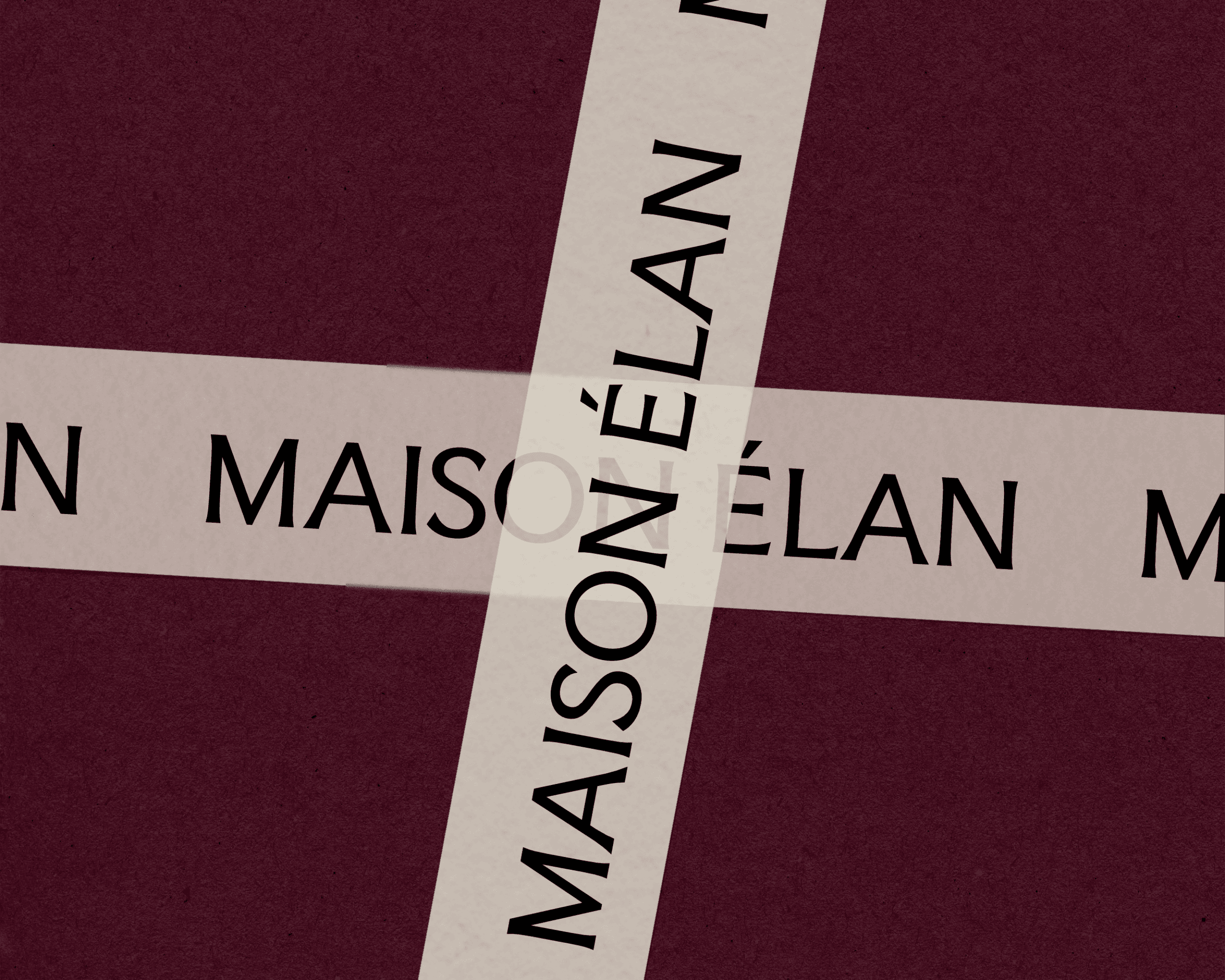 Tape with the Maison Élan logo design printed on it.
