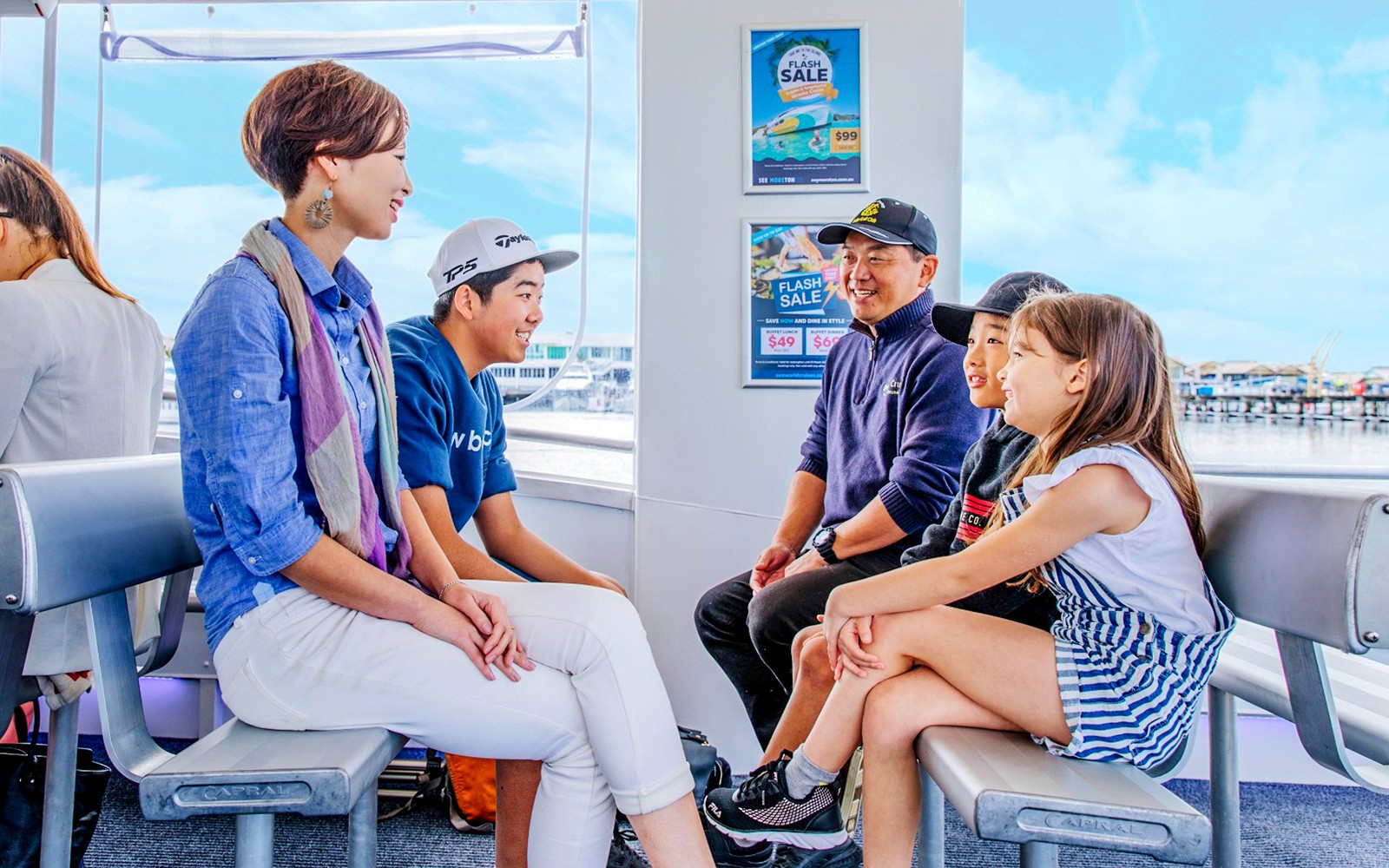 Group enjoying a scenic ride on the Gold Coast Hop On Hop Off Cruise.