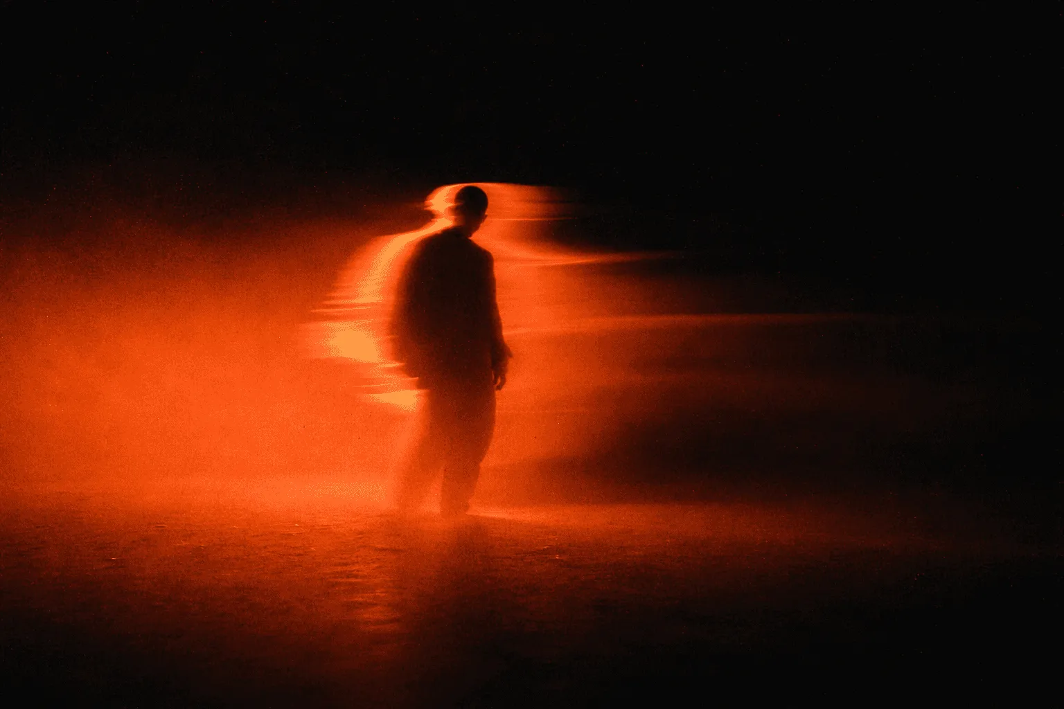 Hero section of the Maayasthra website featuring an abstract motion-blur silhouette, company introduction text, founder profile, and trusted client brand logos.